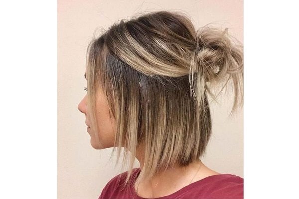 bun hairstyle Bejeweled updos for brides brown hair