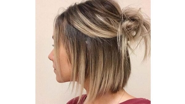 bun hairstyle Bejeweled updos for brides brown hair