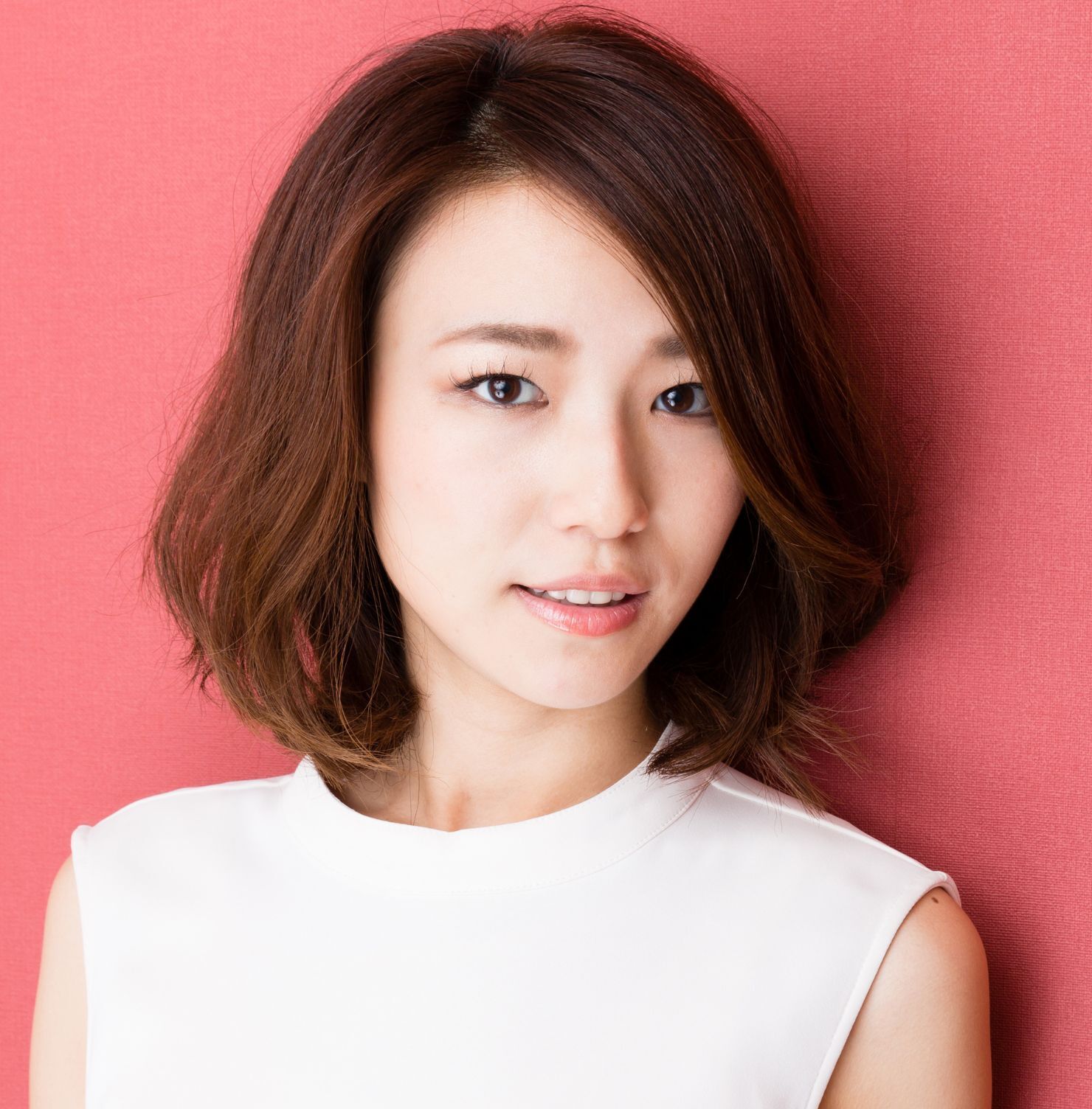 Tóc duỗi cụp nhẹ nhàng cho mặt dài