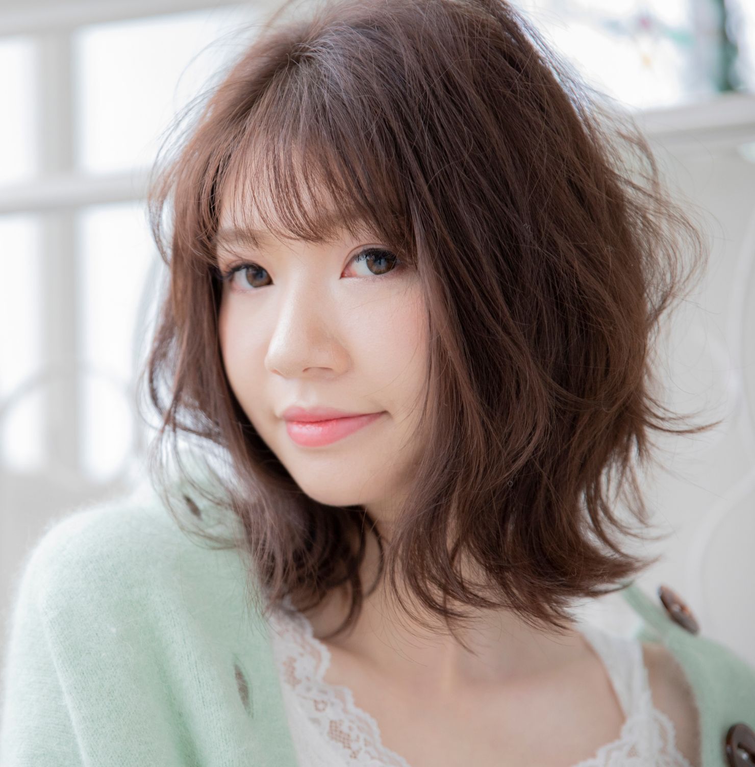  Tóc ngắn uốn đuôi