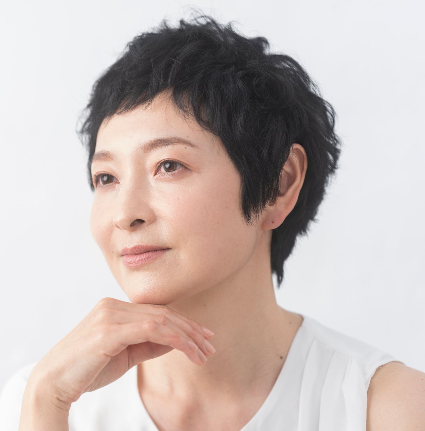 Tóc uốn ngắn cho tuổi trung niên