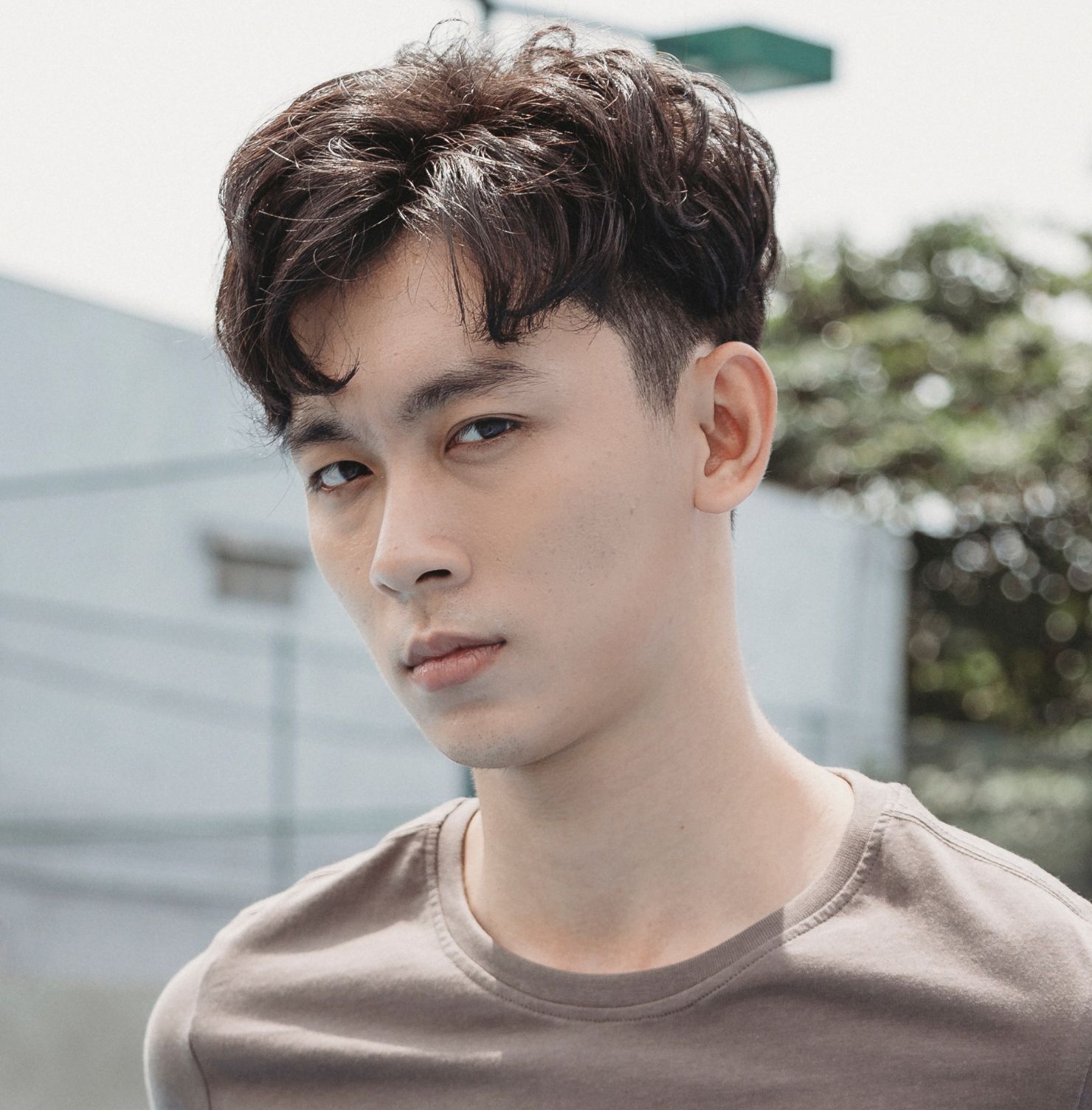Kiểu tóc 7/3 nam uốn xoăn
