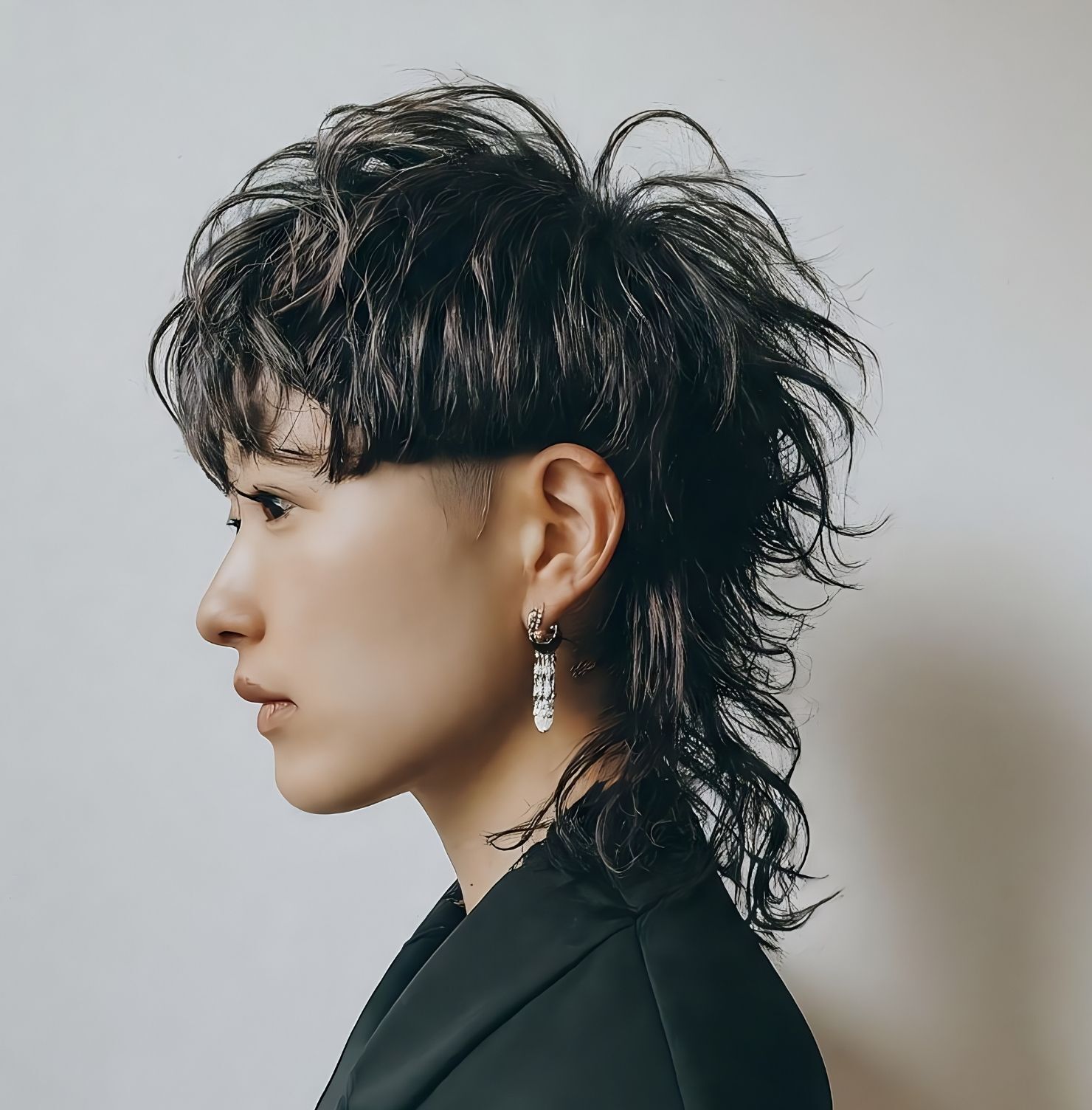 Tóc mullet uốn xoăn tỉa layer nữ mặt tròn