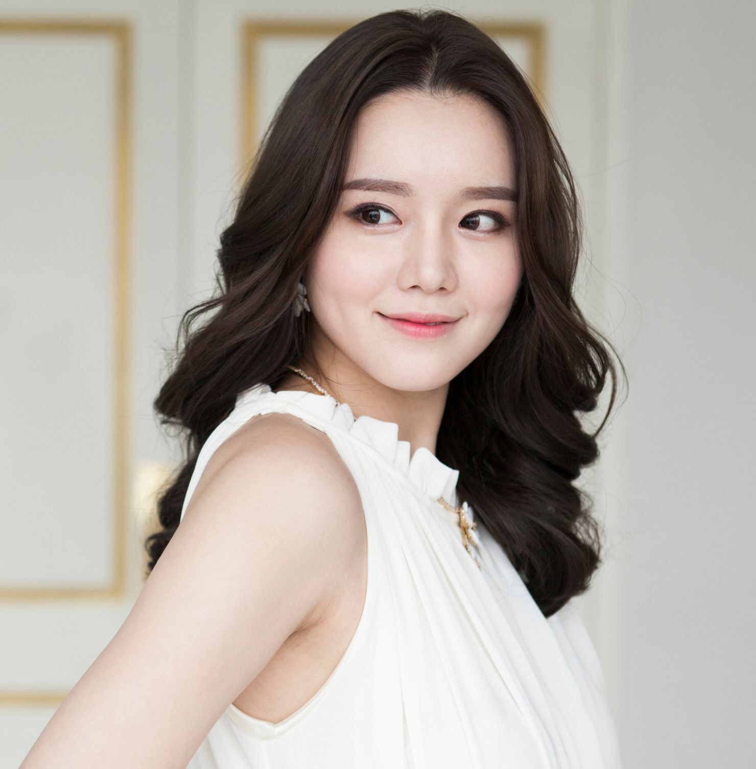 Tóc layer nữ dài uốn đuôi