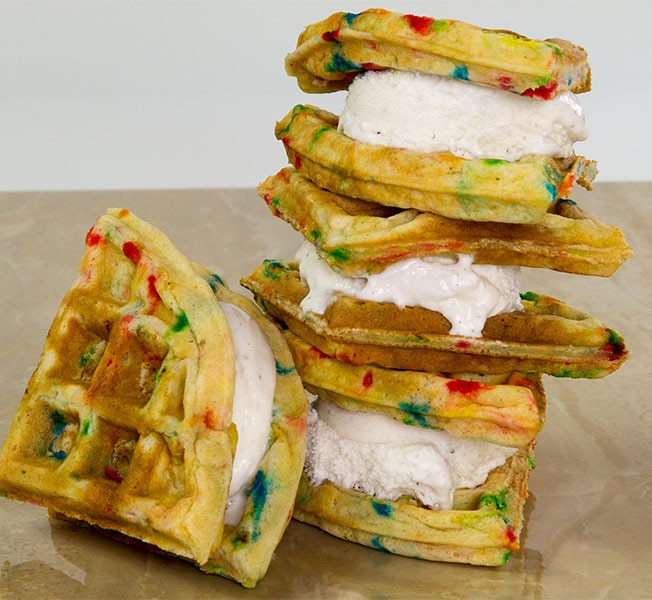 Stack of delicious waffle ice cream sandwiches.