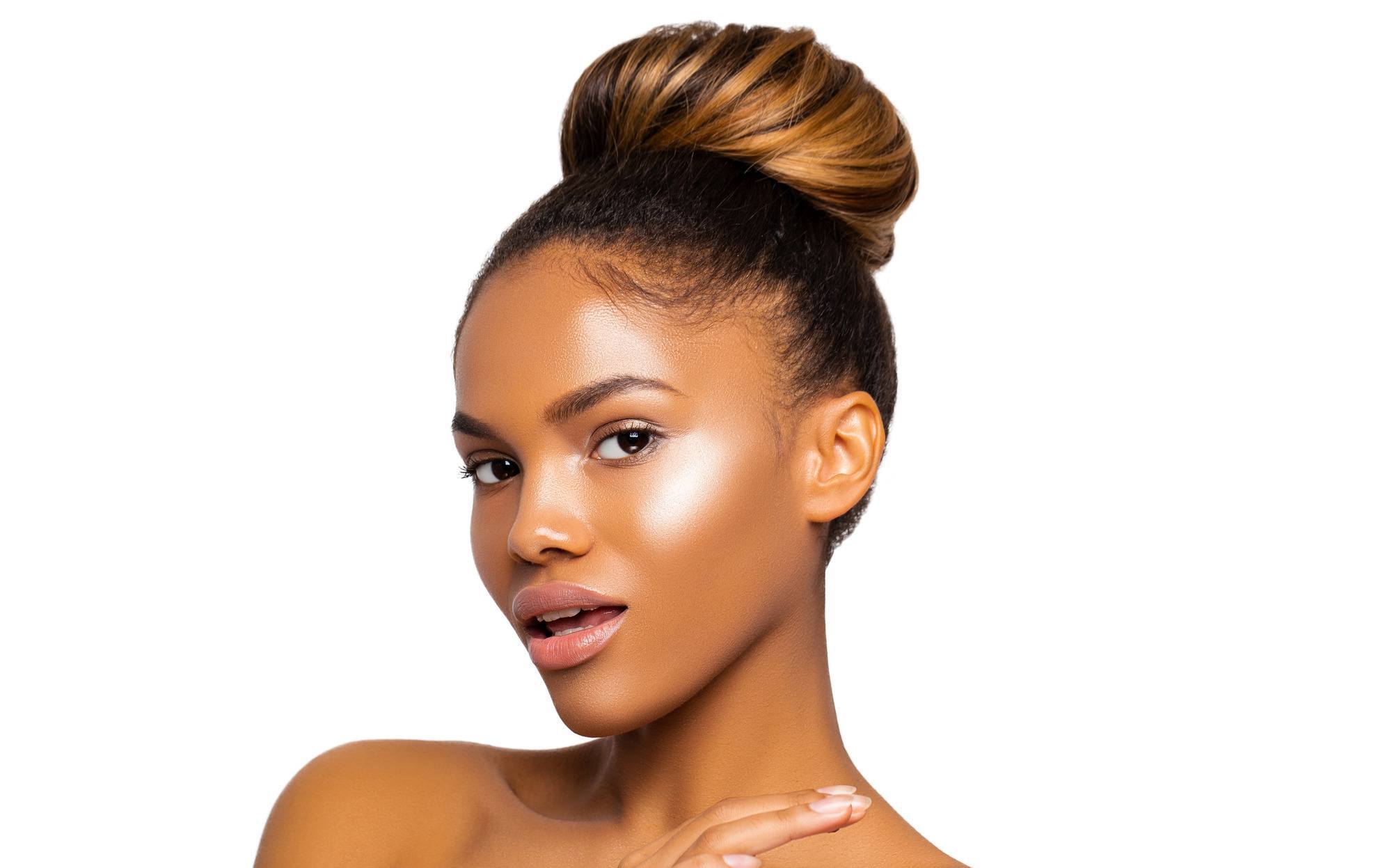 woman with a high ballerina bun hairstyle