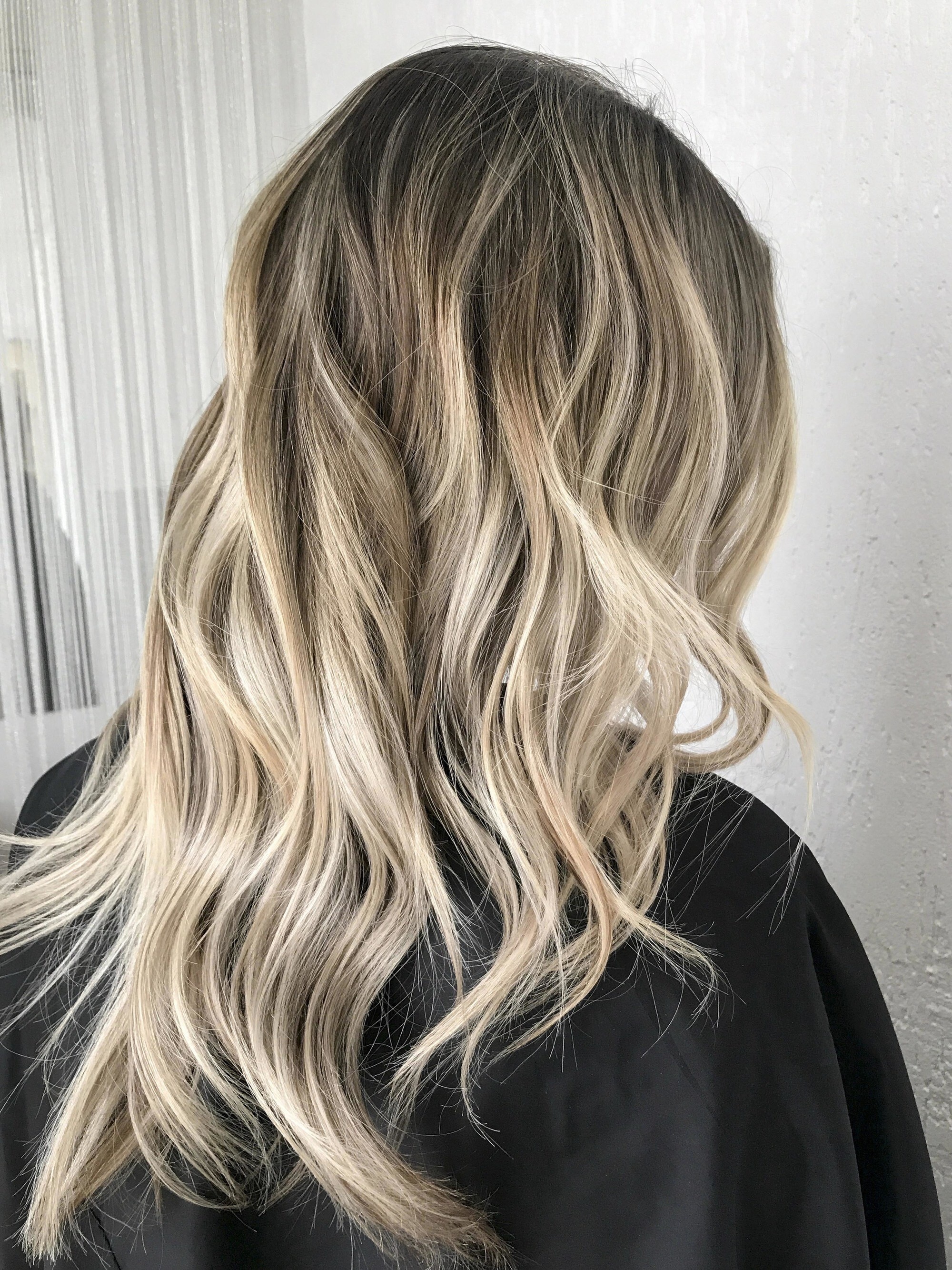woman with medium length hair golden blonde ombre