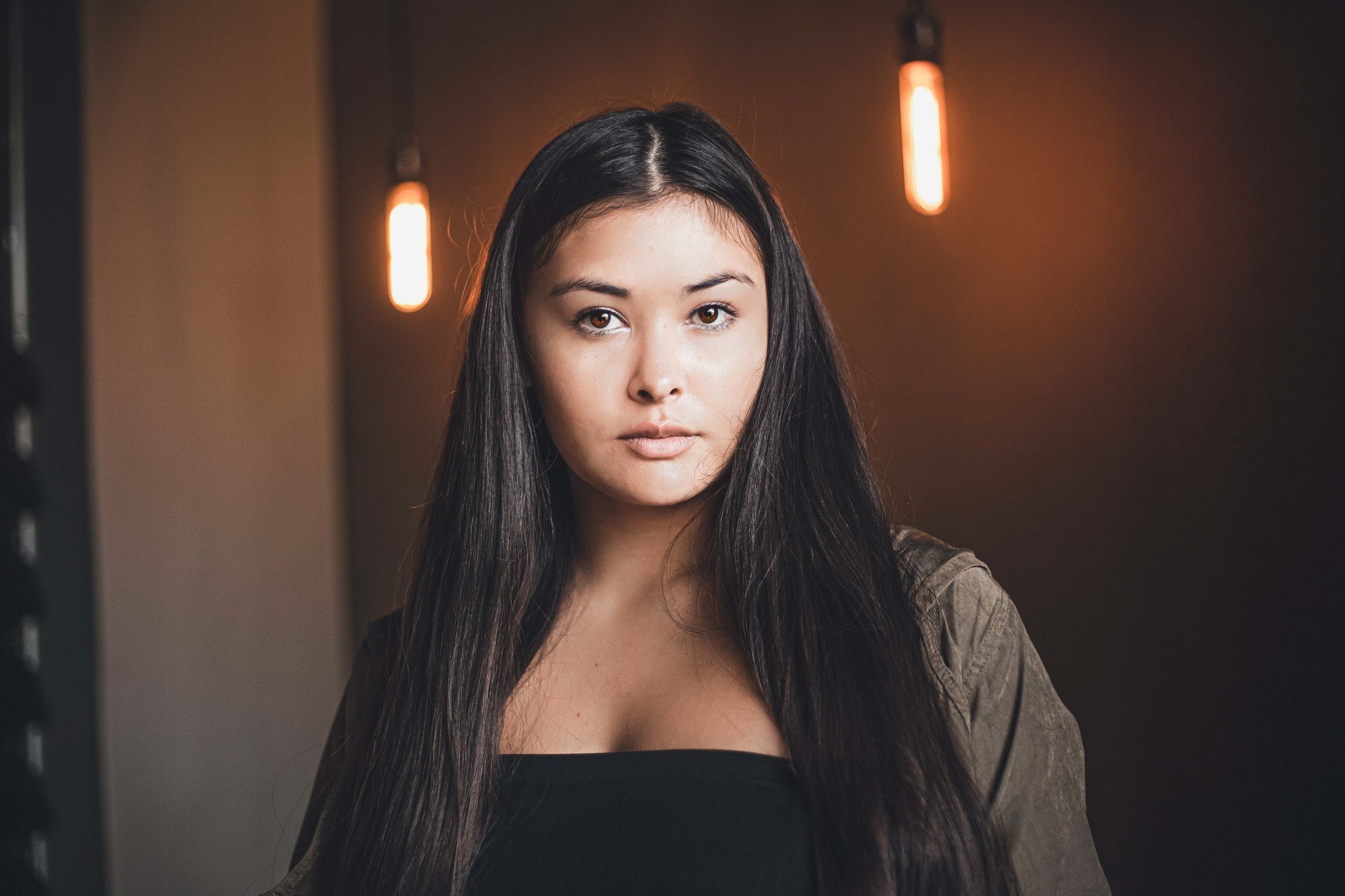 Engagement hairstyle: woman with pin straight dark brown hair