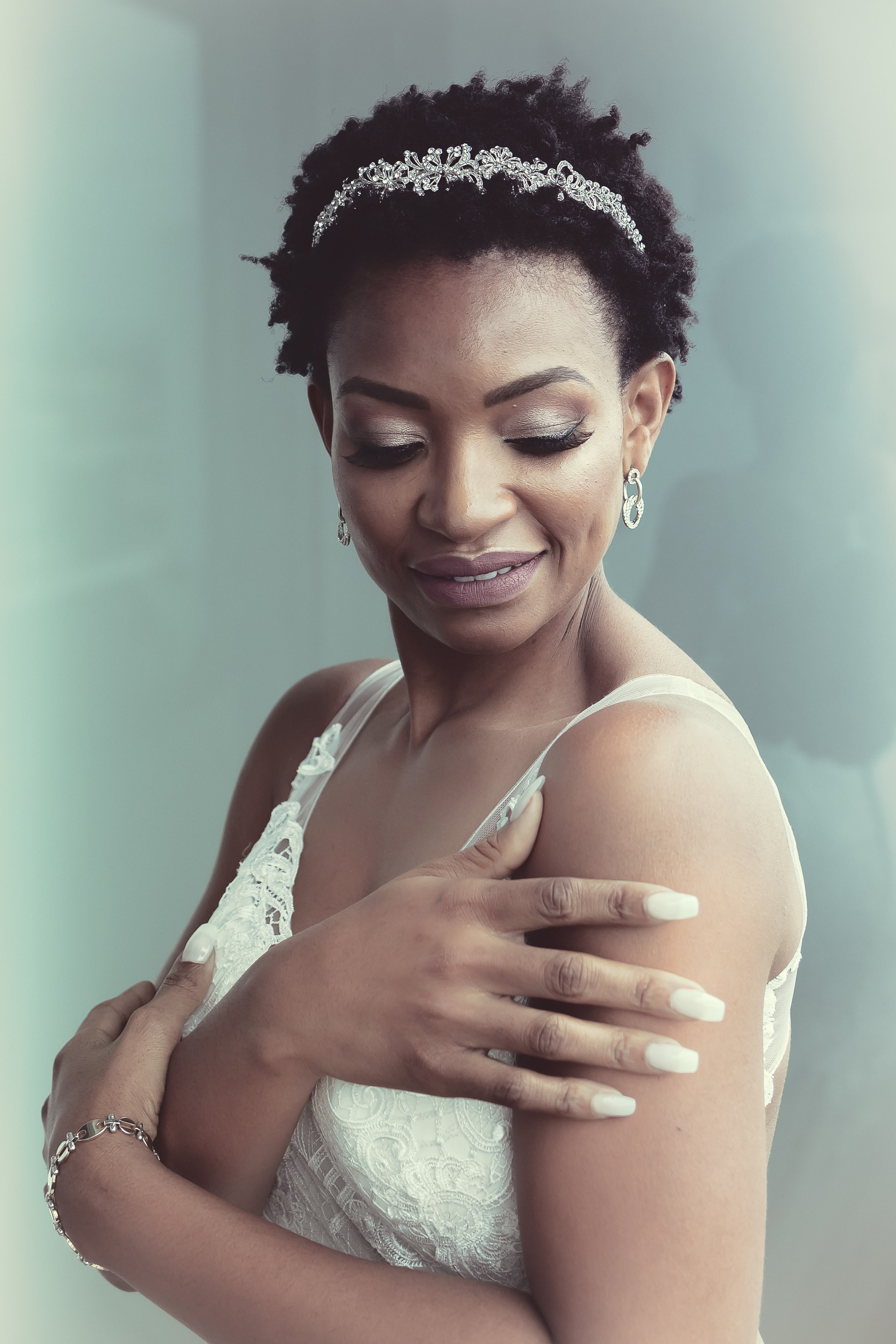 short natural hair pixie cut wedding hairstyle with accessory