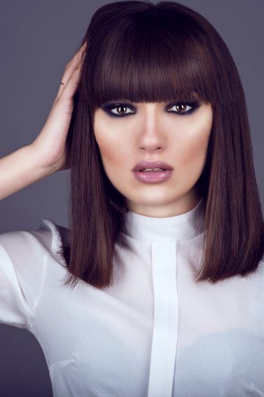 woman with straight hair bob hairstyle