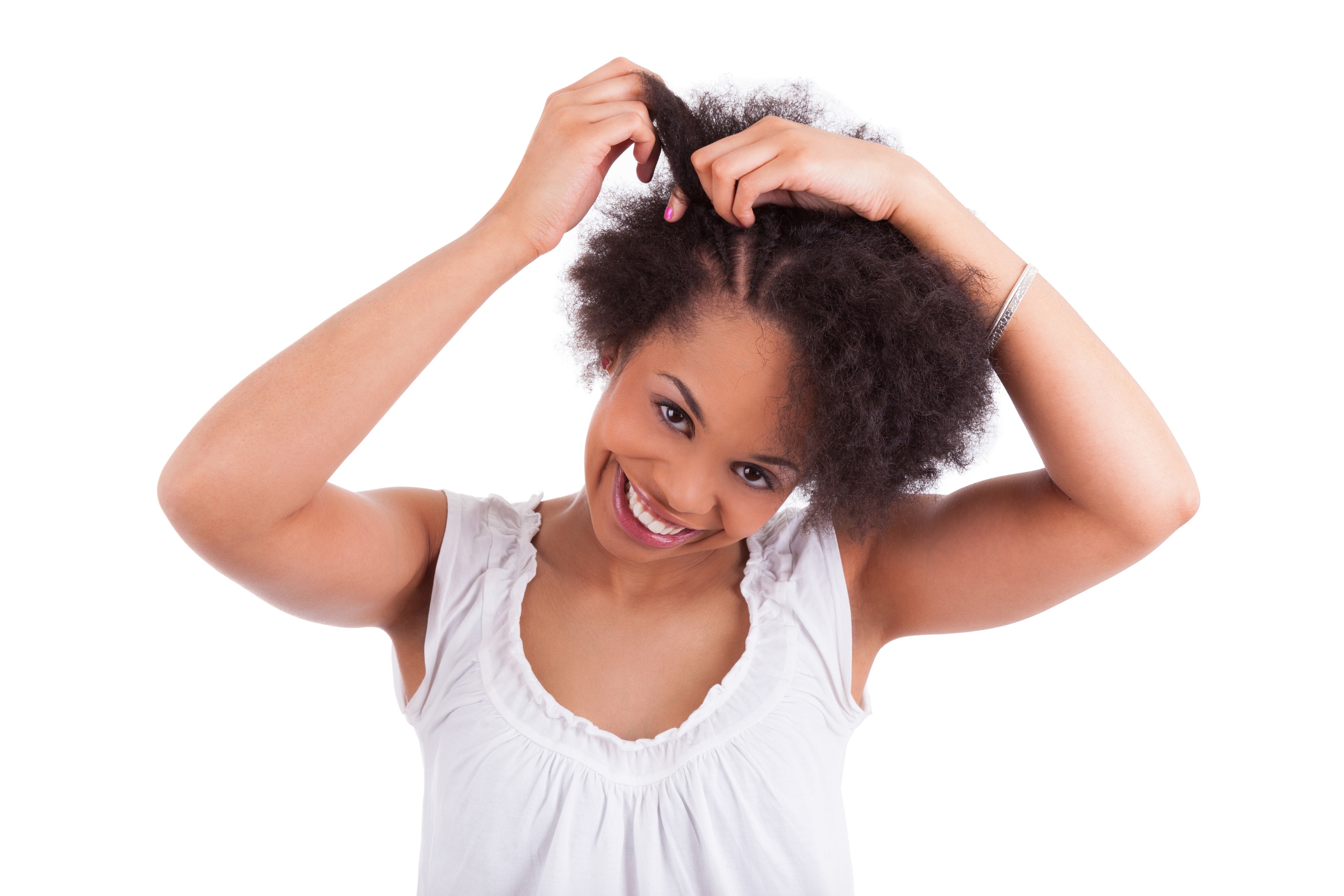 woman braiding natural hair