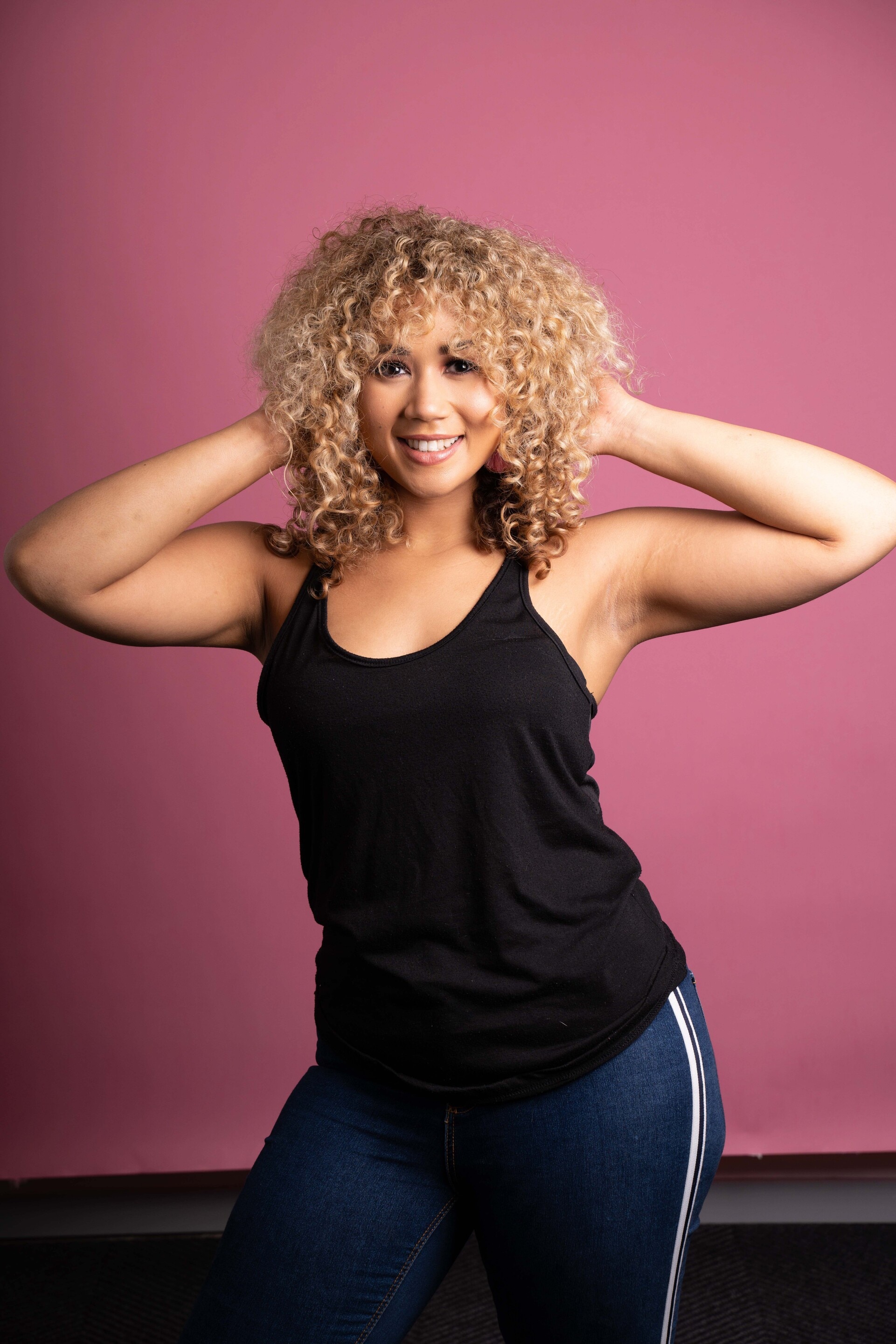 woman with blonde curly hair