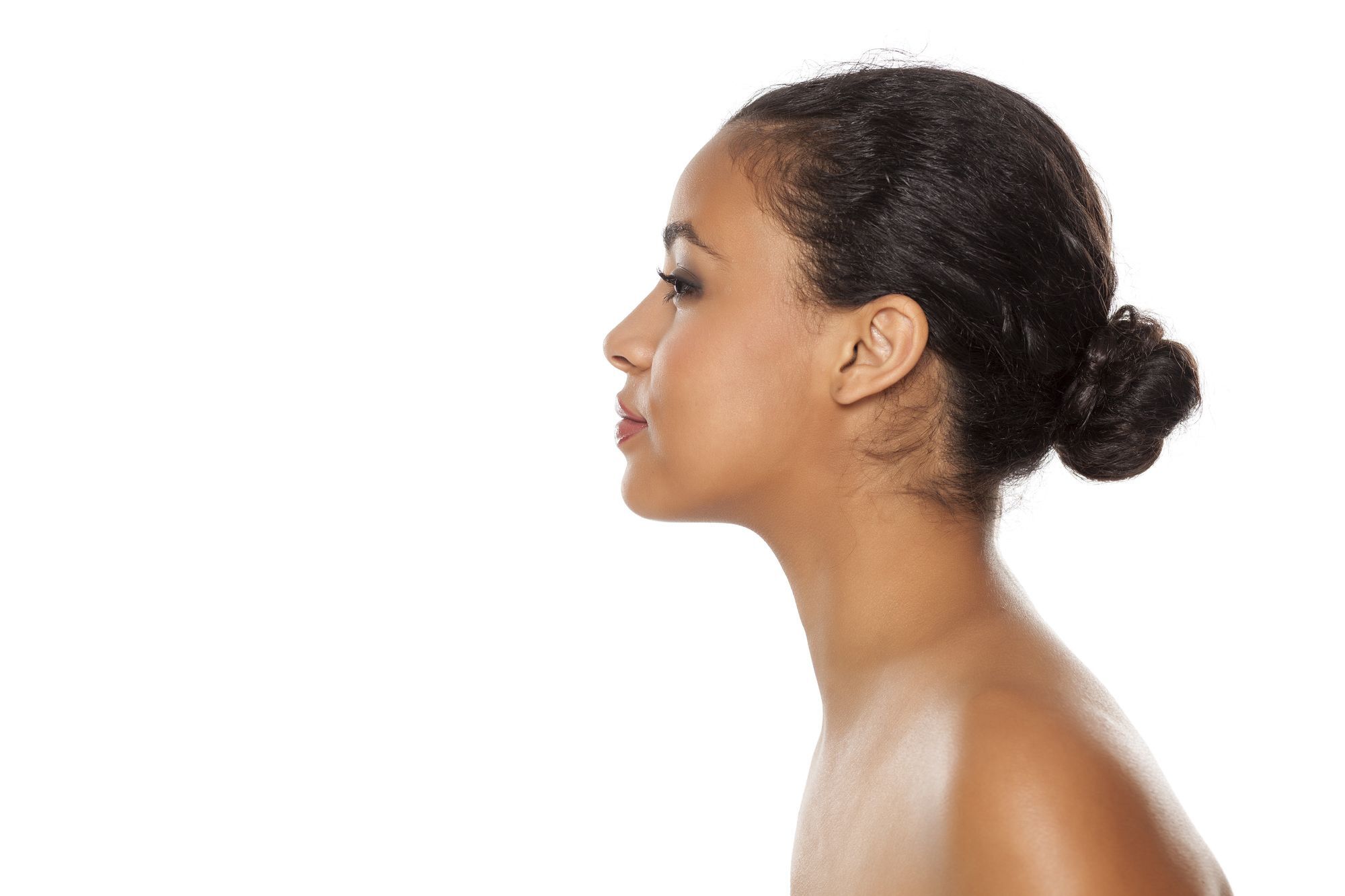 woman with a low bun hairstyle