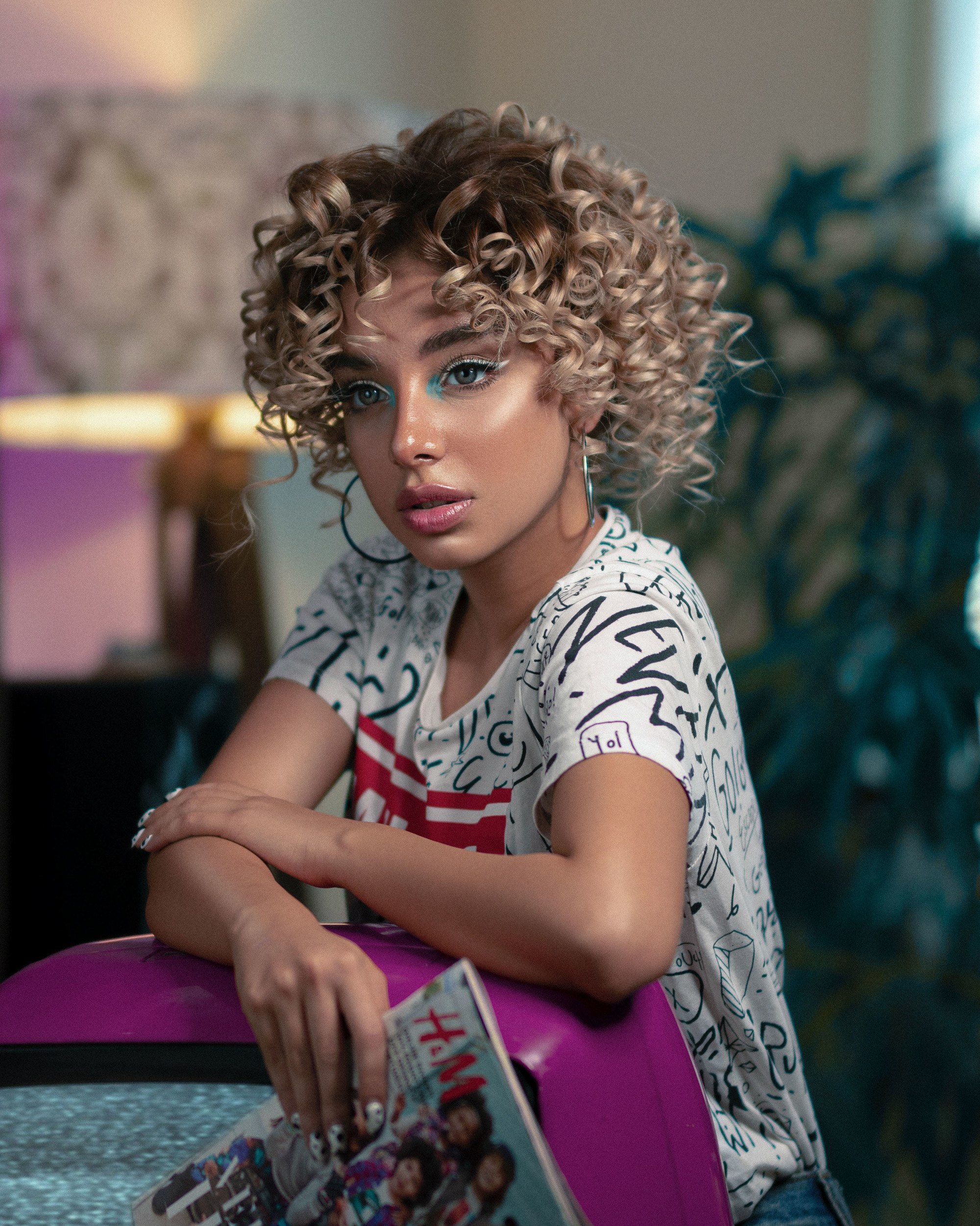 woman with a curly bob hairstyle