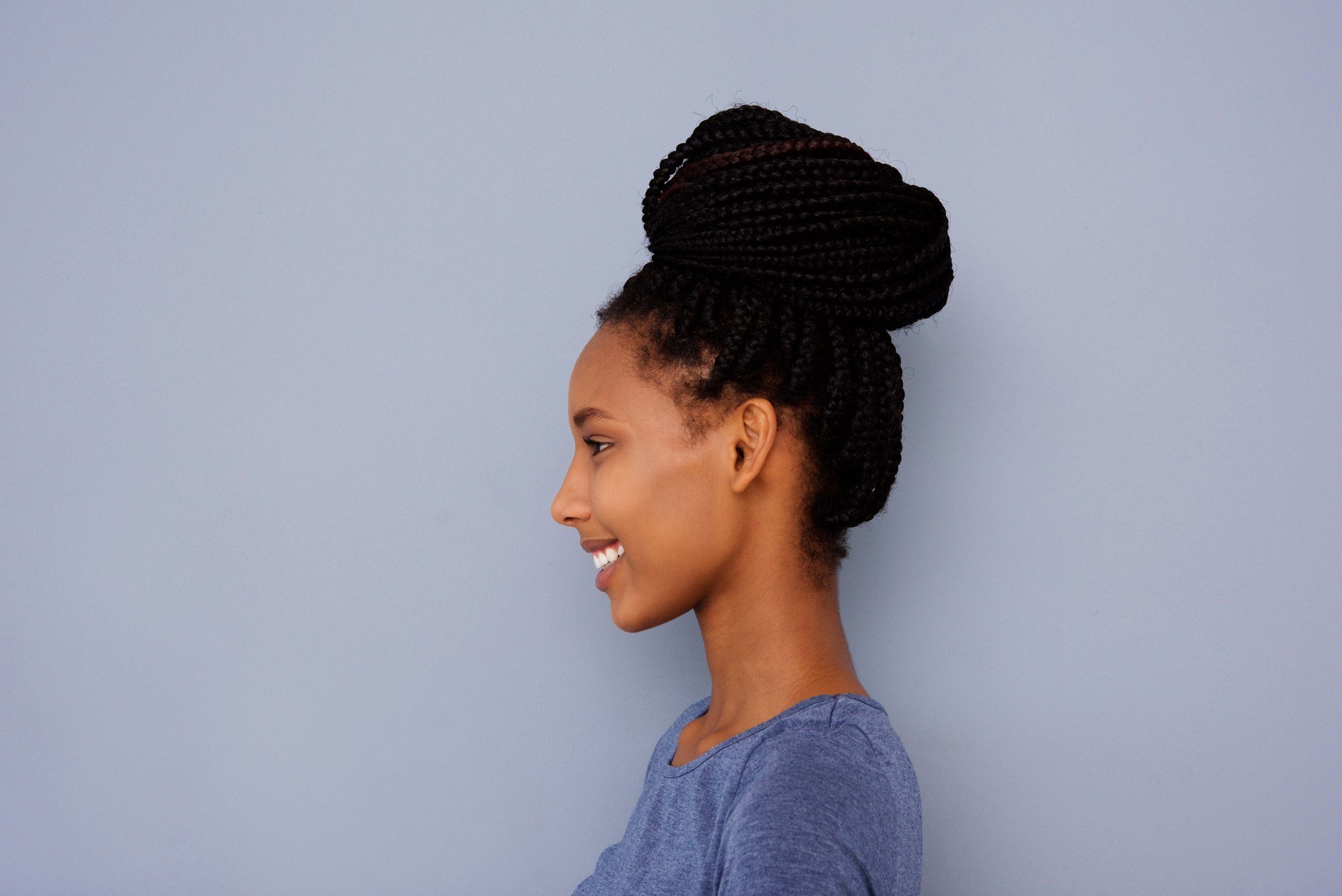 Woman with a braided bun hairstyle for an interview