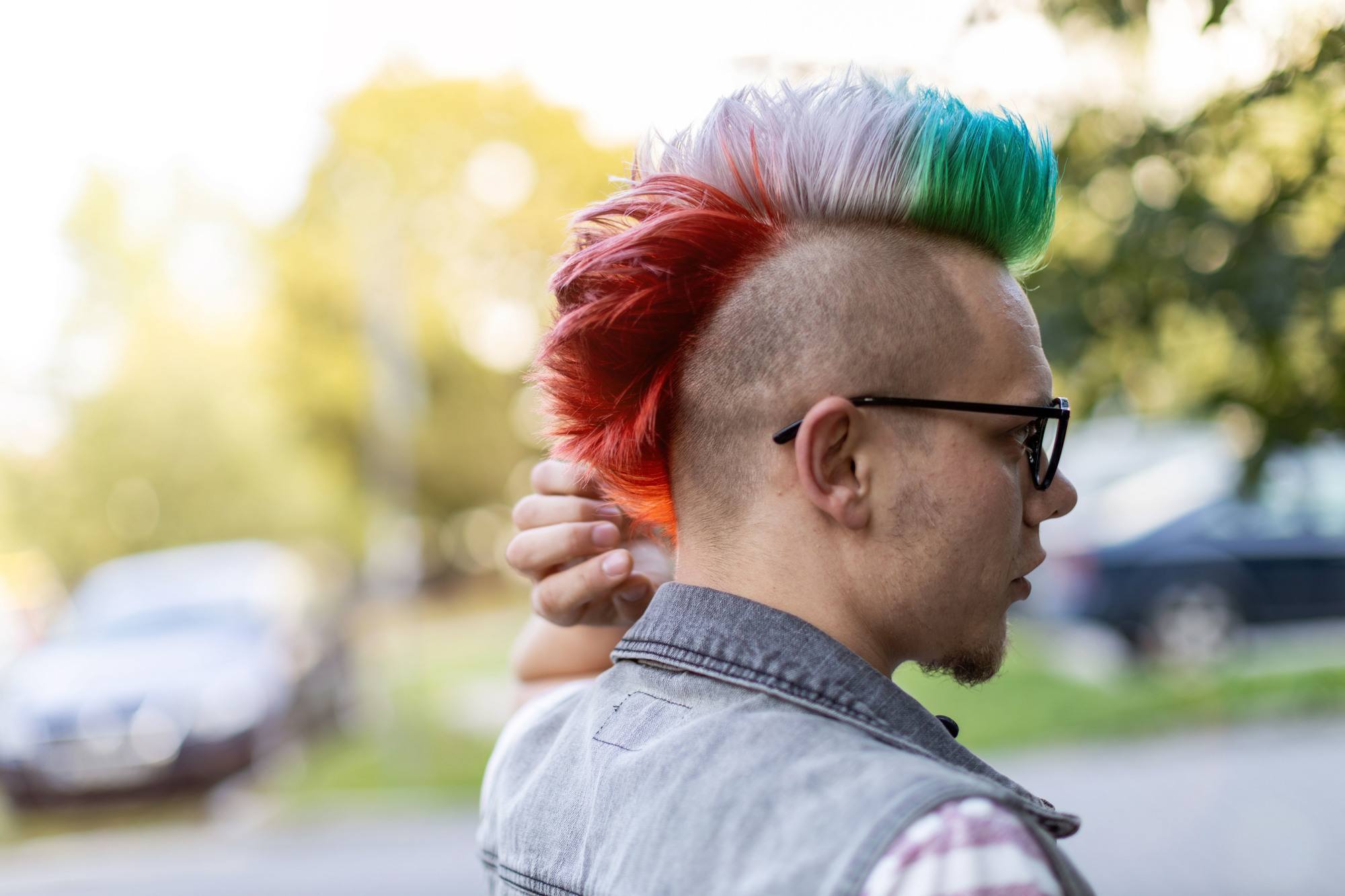 Man wearing a rainbow Mohawk