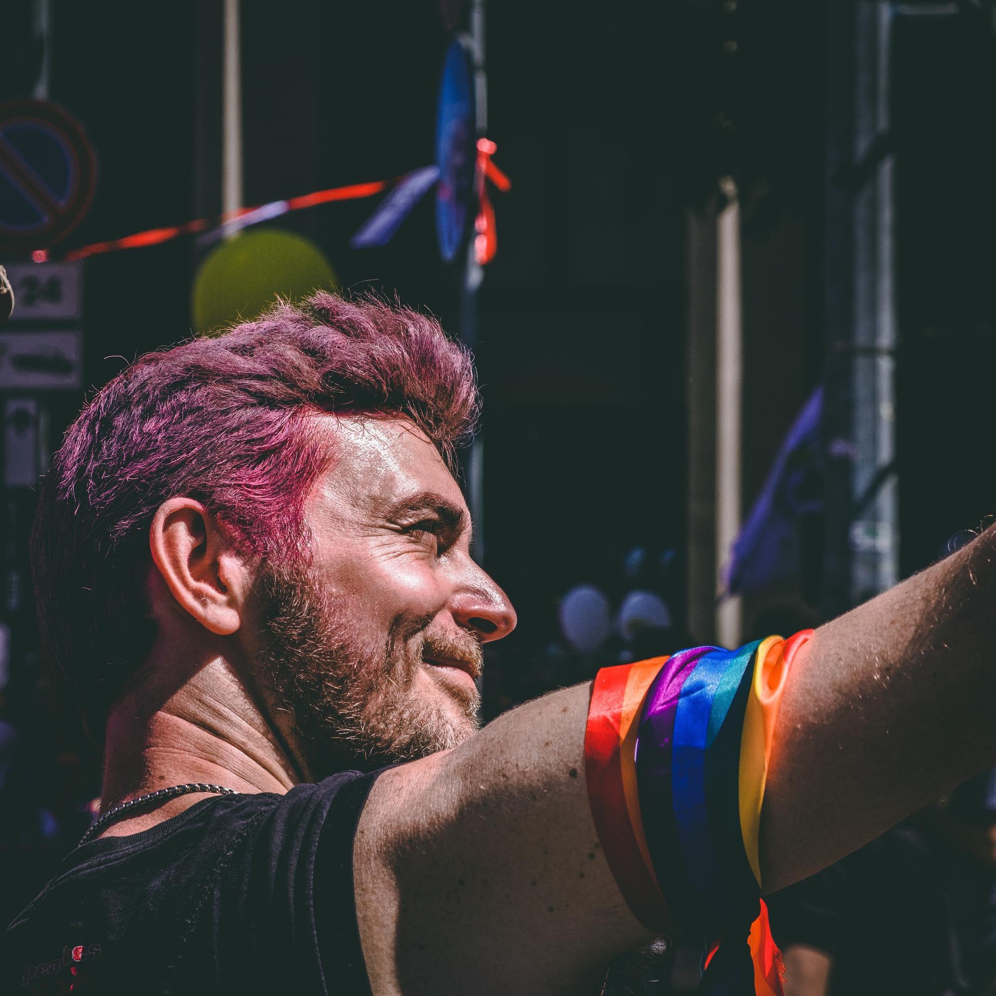Man with pink hair colour for Pride