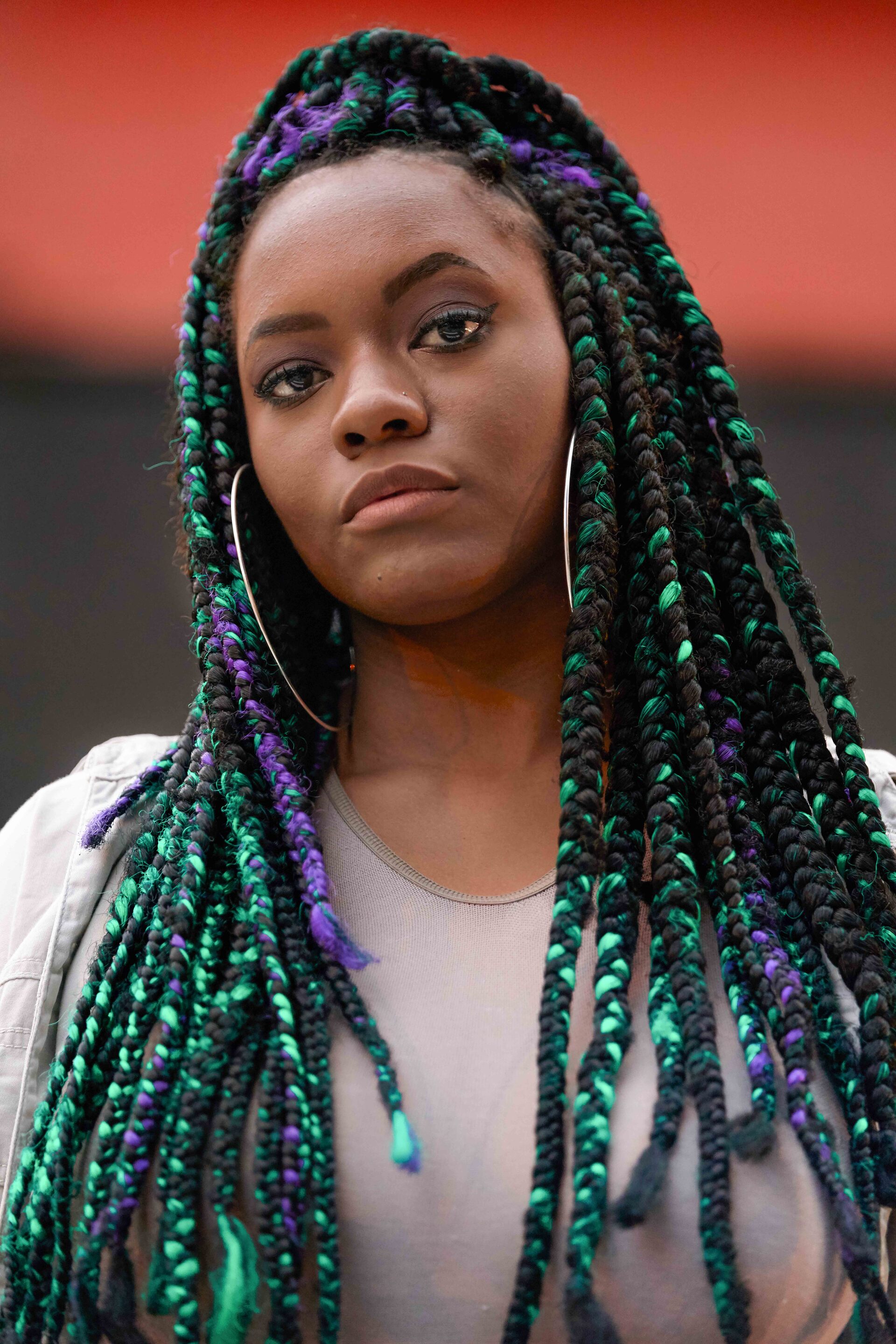 girl with long colourful purple and green hairstyle