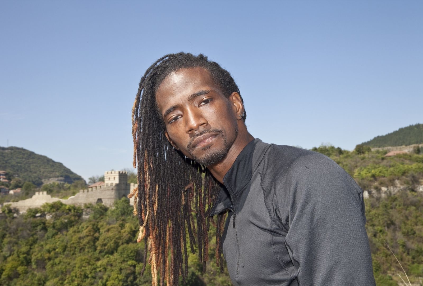 man with long ombre locs hairstyle
