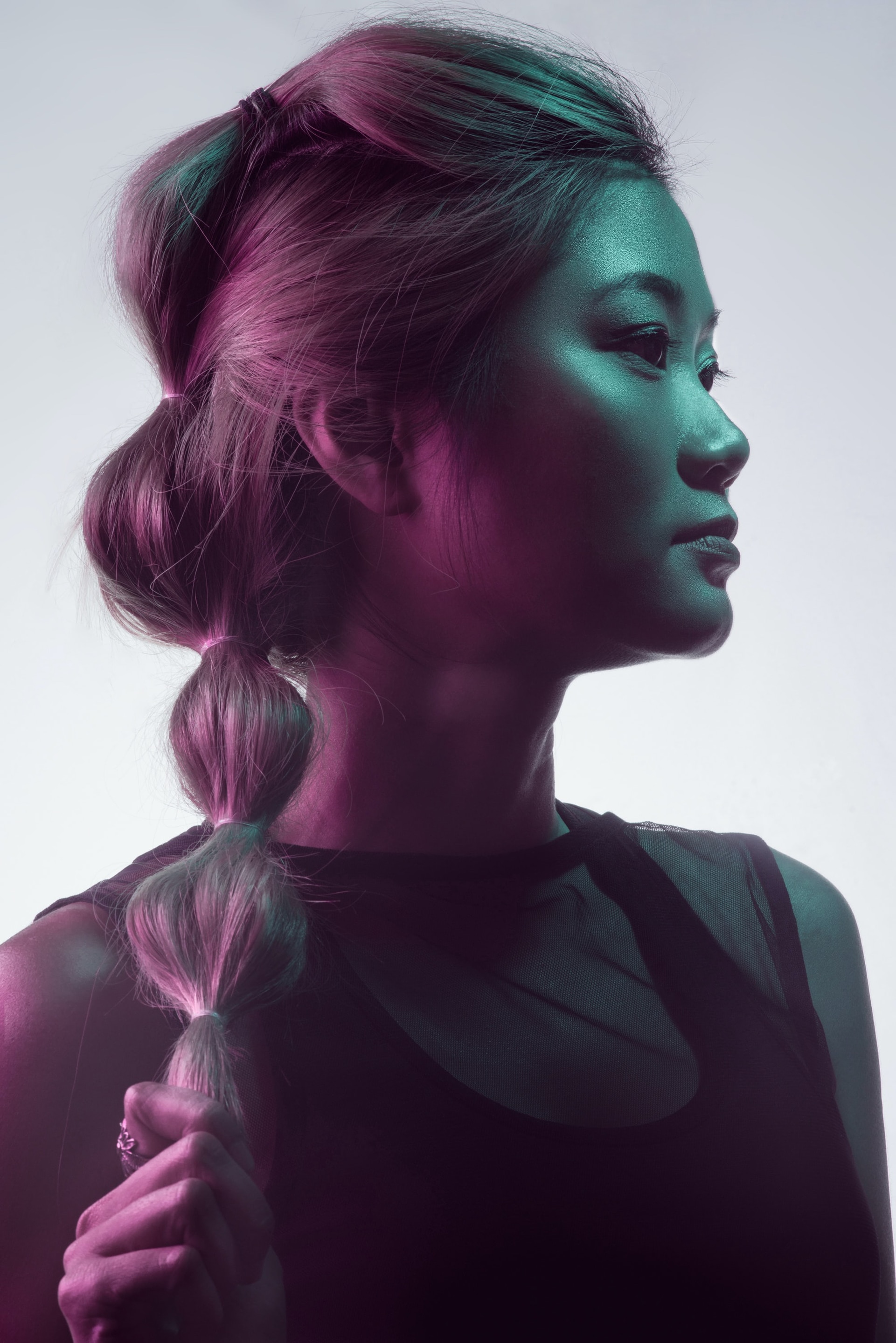 Woman wearing a fun bubble ponytail hairstyle