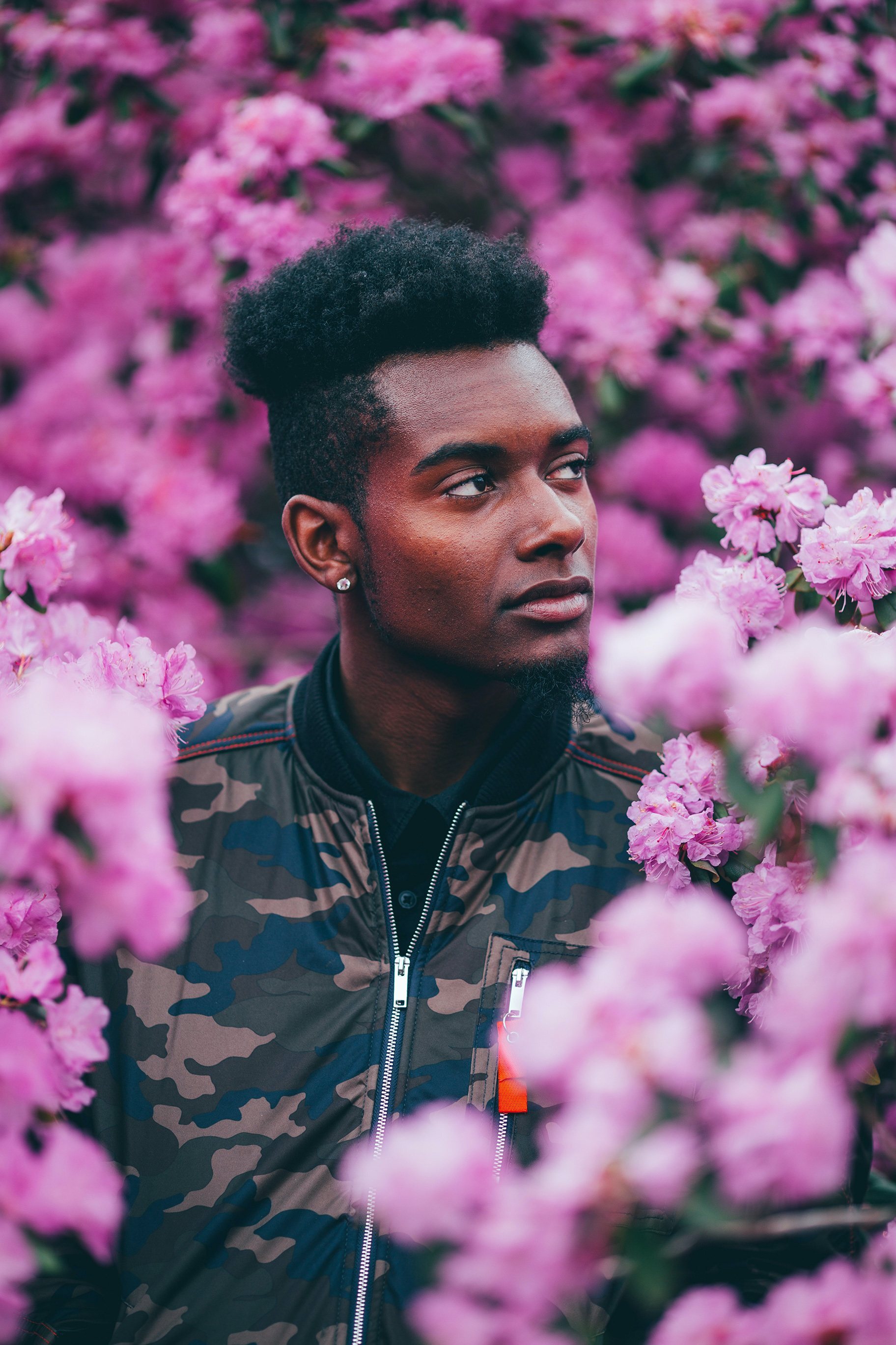 square faces: man with an undercut hairstyle with natural hair