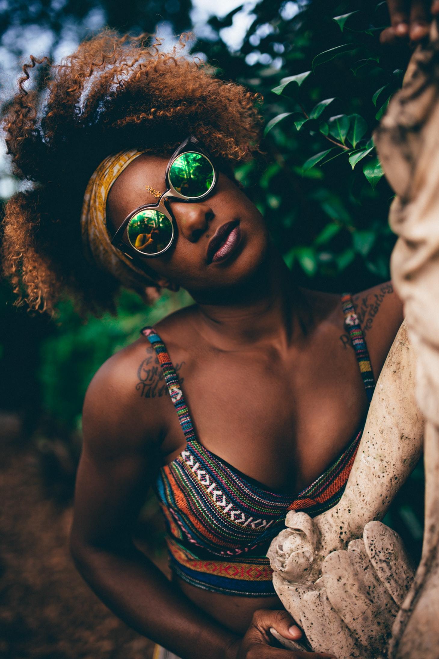 woman with an afro and a headband