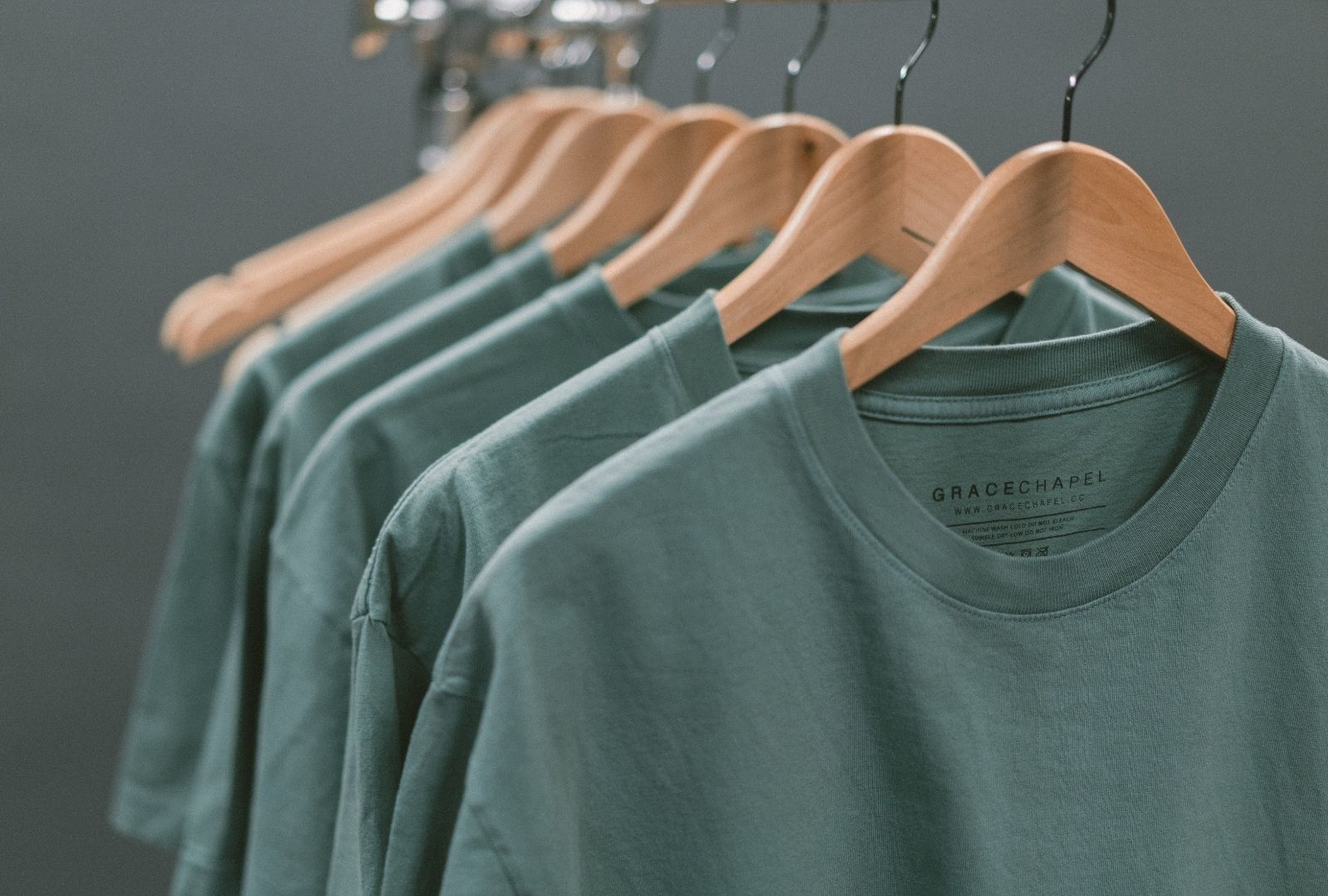a rack with shirts hanging up