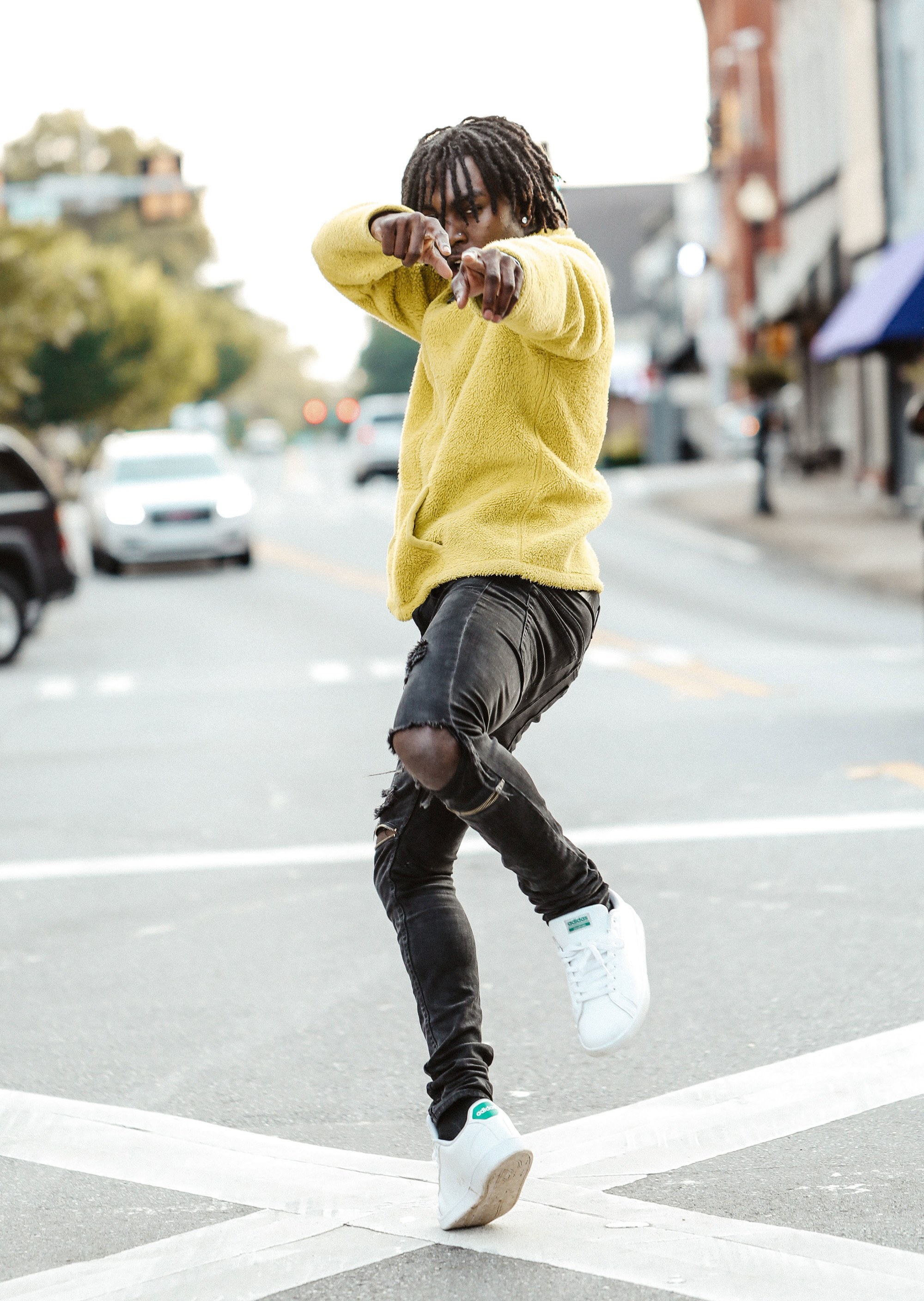 men’s medium hairstyles: man with medium-length locs hairstyle