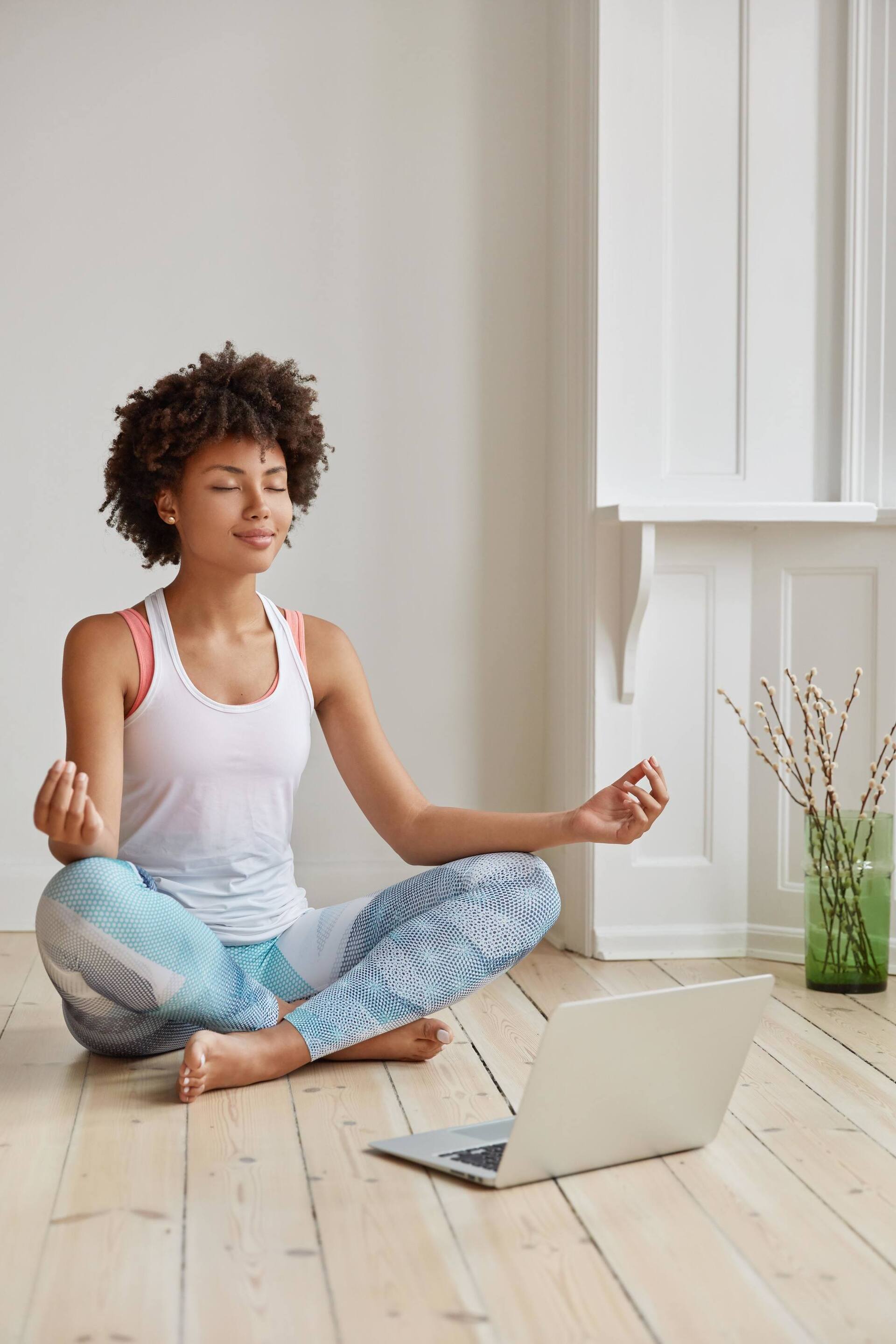 Woman keeping calm by doing breathing exercises