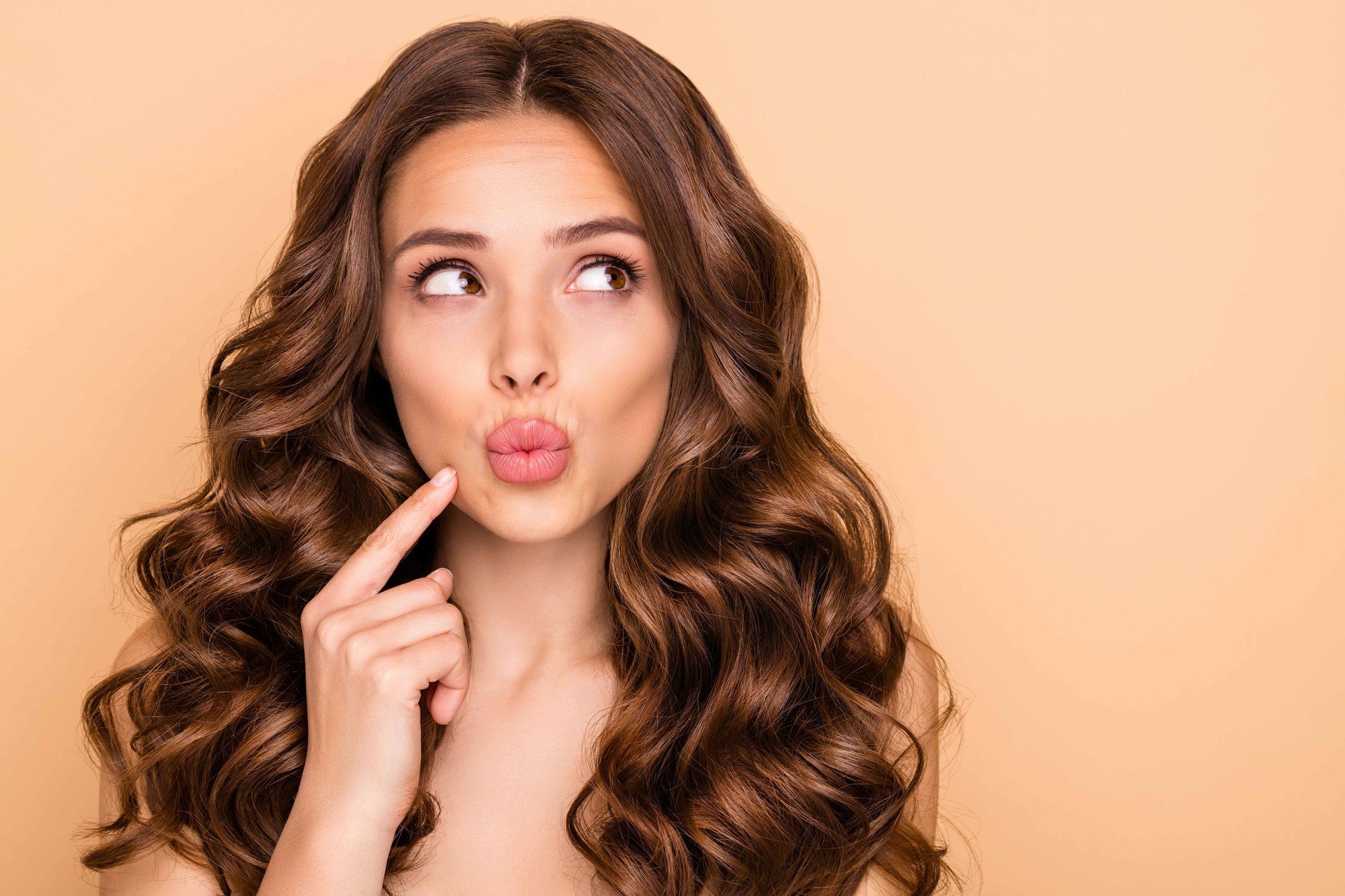 brown hair: long, thick waves Taurus inspired hairstyle