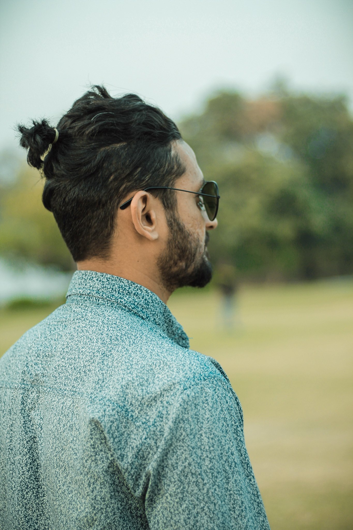 Man bun with stubble