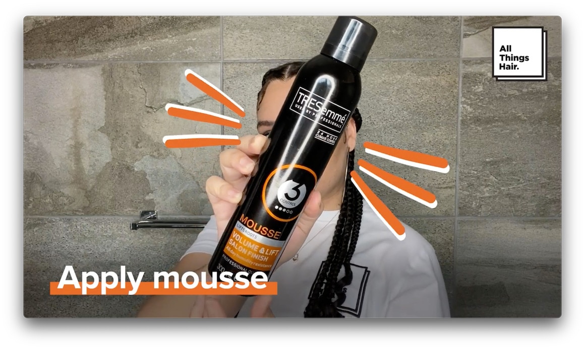Apply mousse to jumbo curl braids