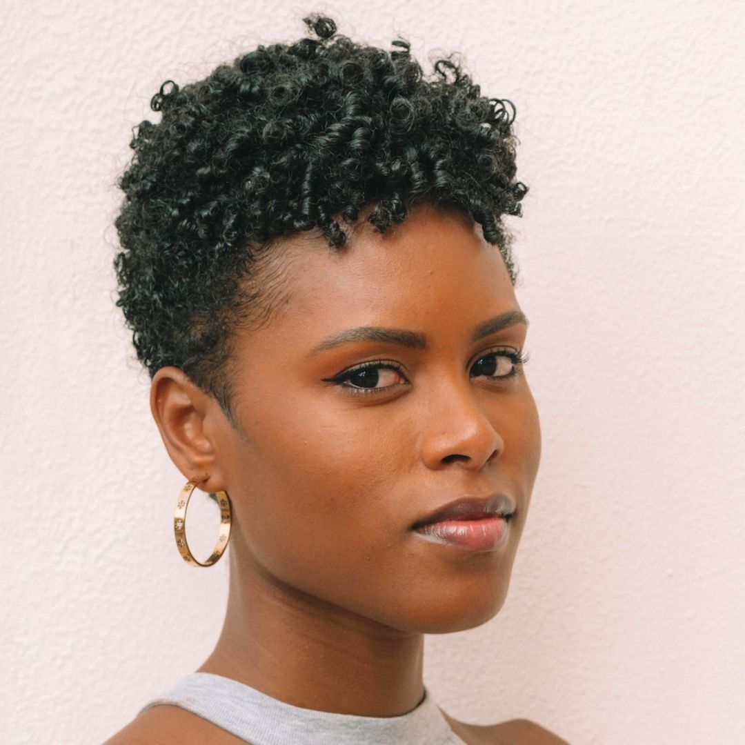 Woman with short defined curls