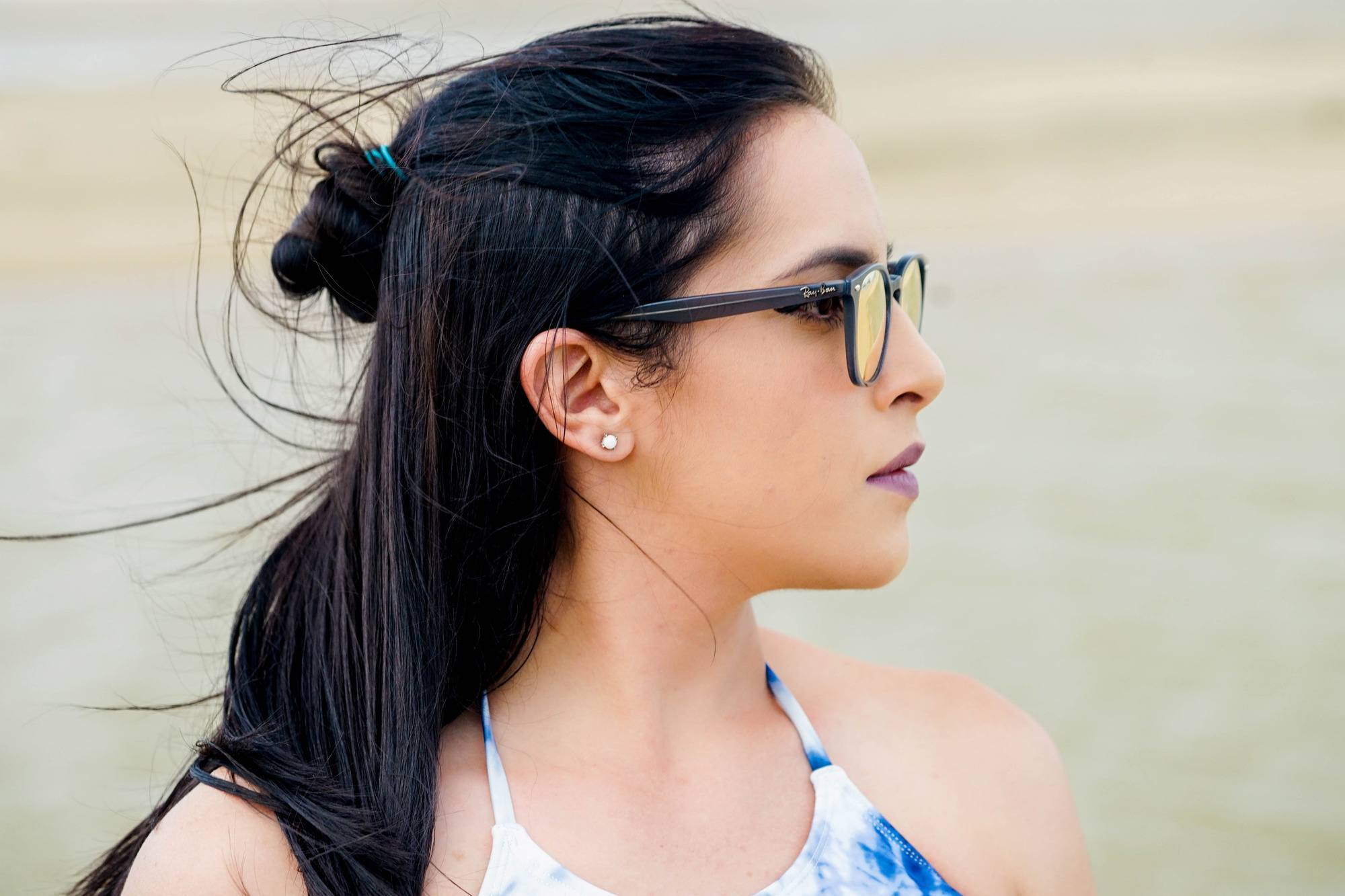 Slick hairstyle: woman wearing a half updo