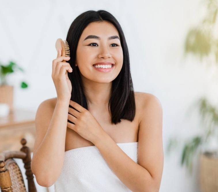 Woman brushing her hair