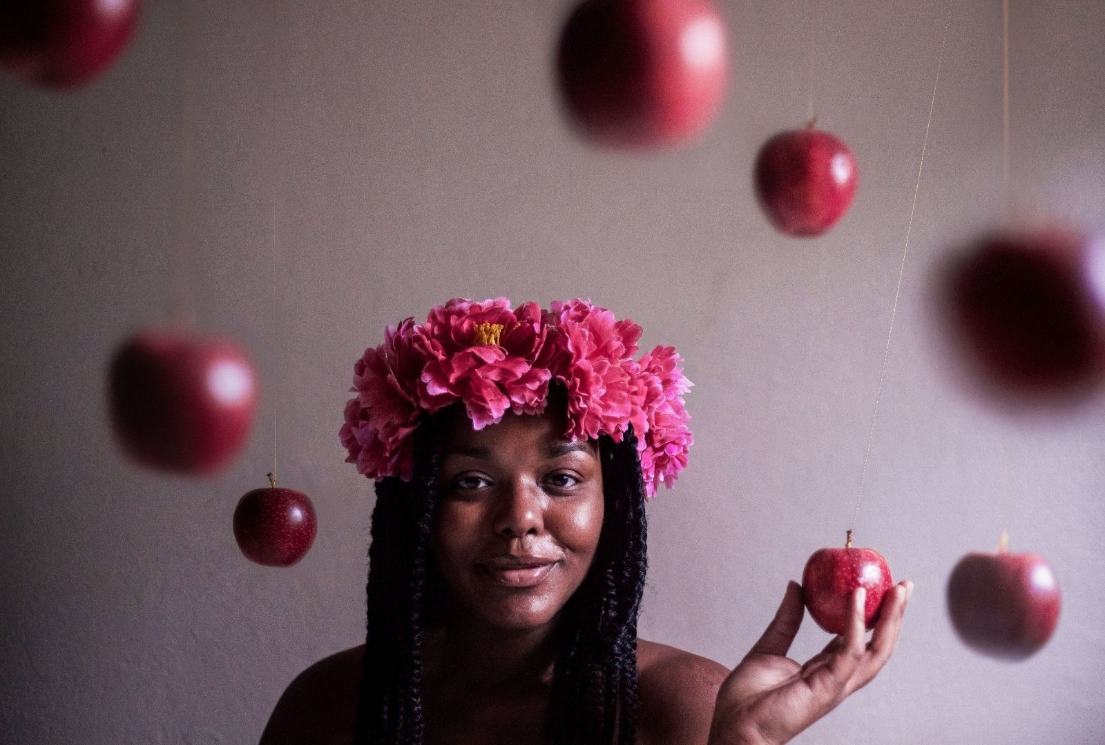 woman wearing a pink flower crown