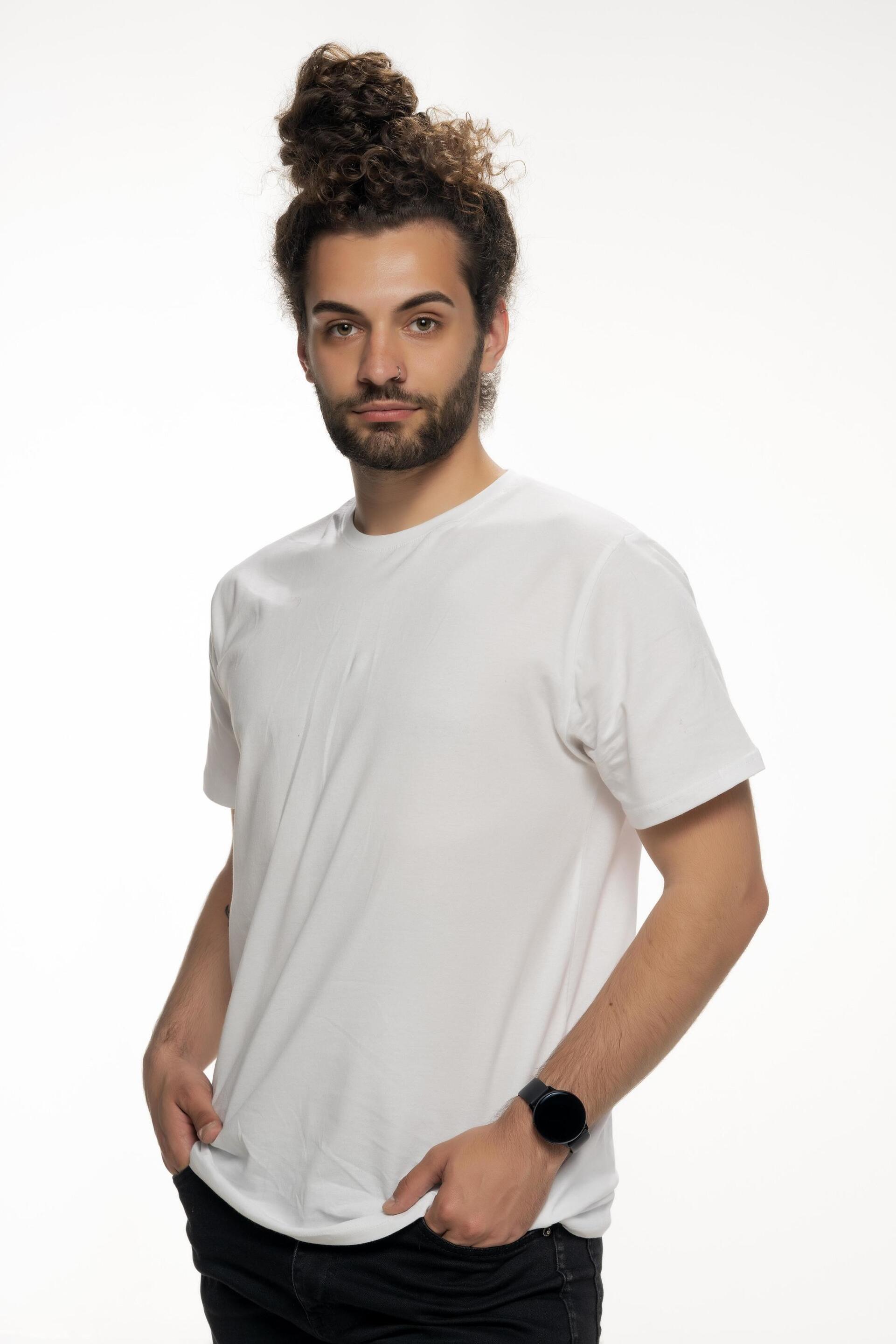 Man with curly hair in a messy bun