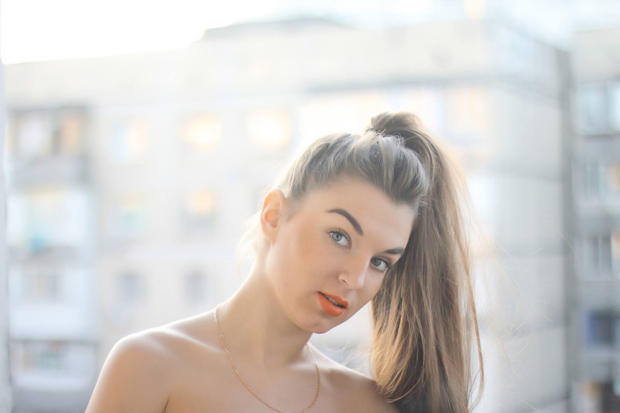curl your hair: woman with a very high ponytail