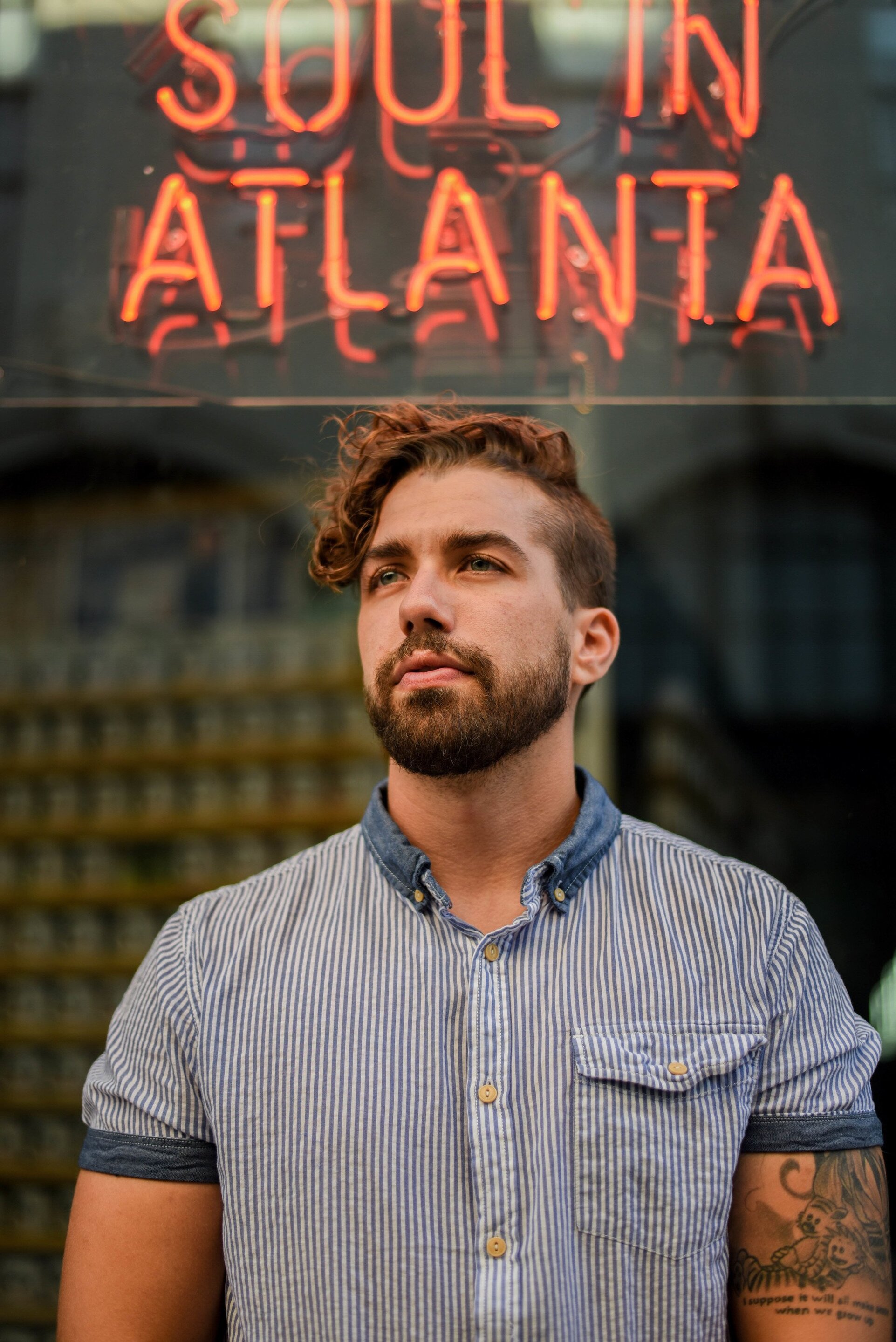 Man with combed over curly hairstyle and haircut for men