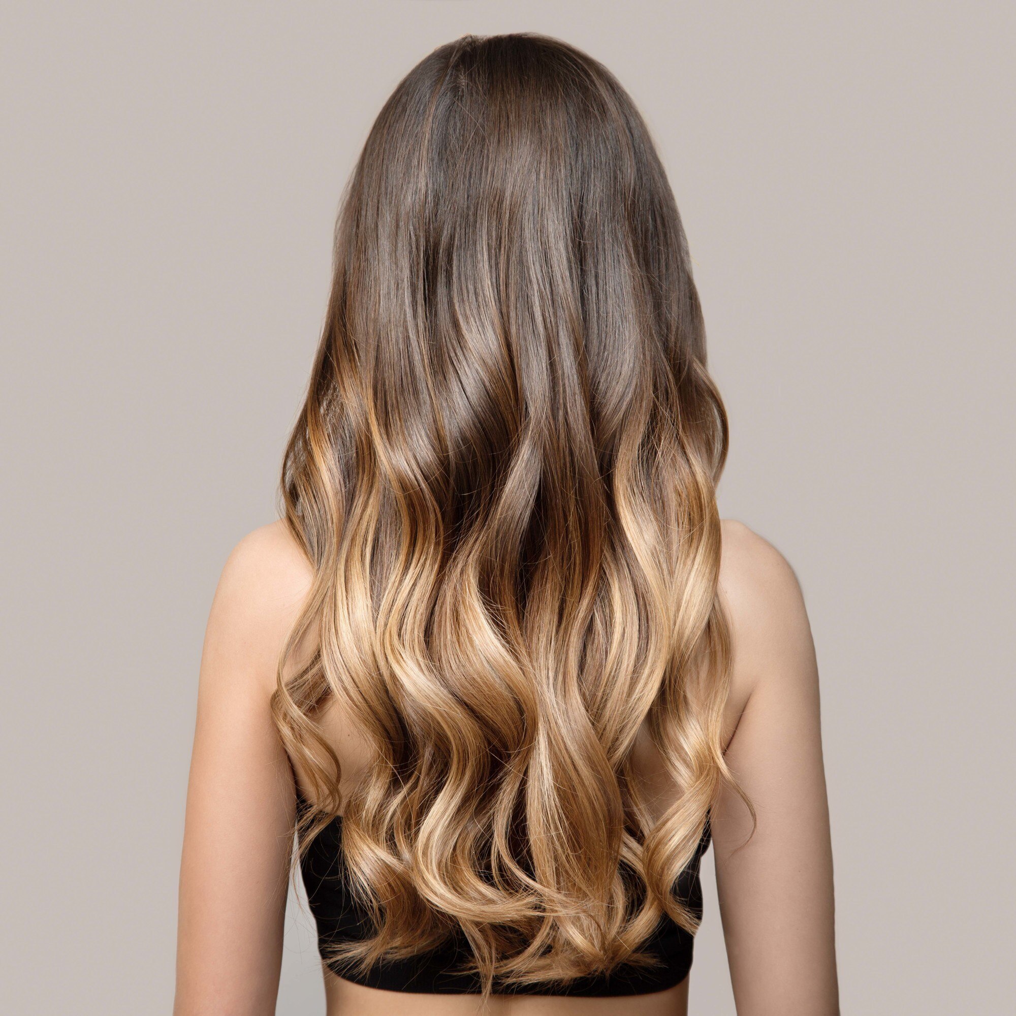 woman with long hair lose curls