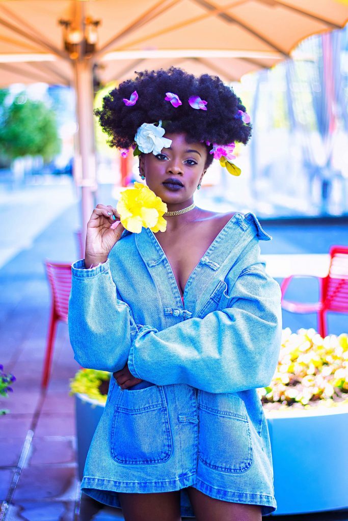 big afro with colourful flowers