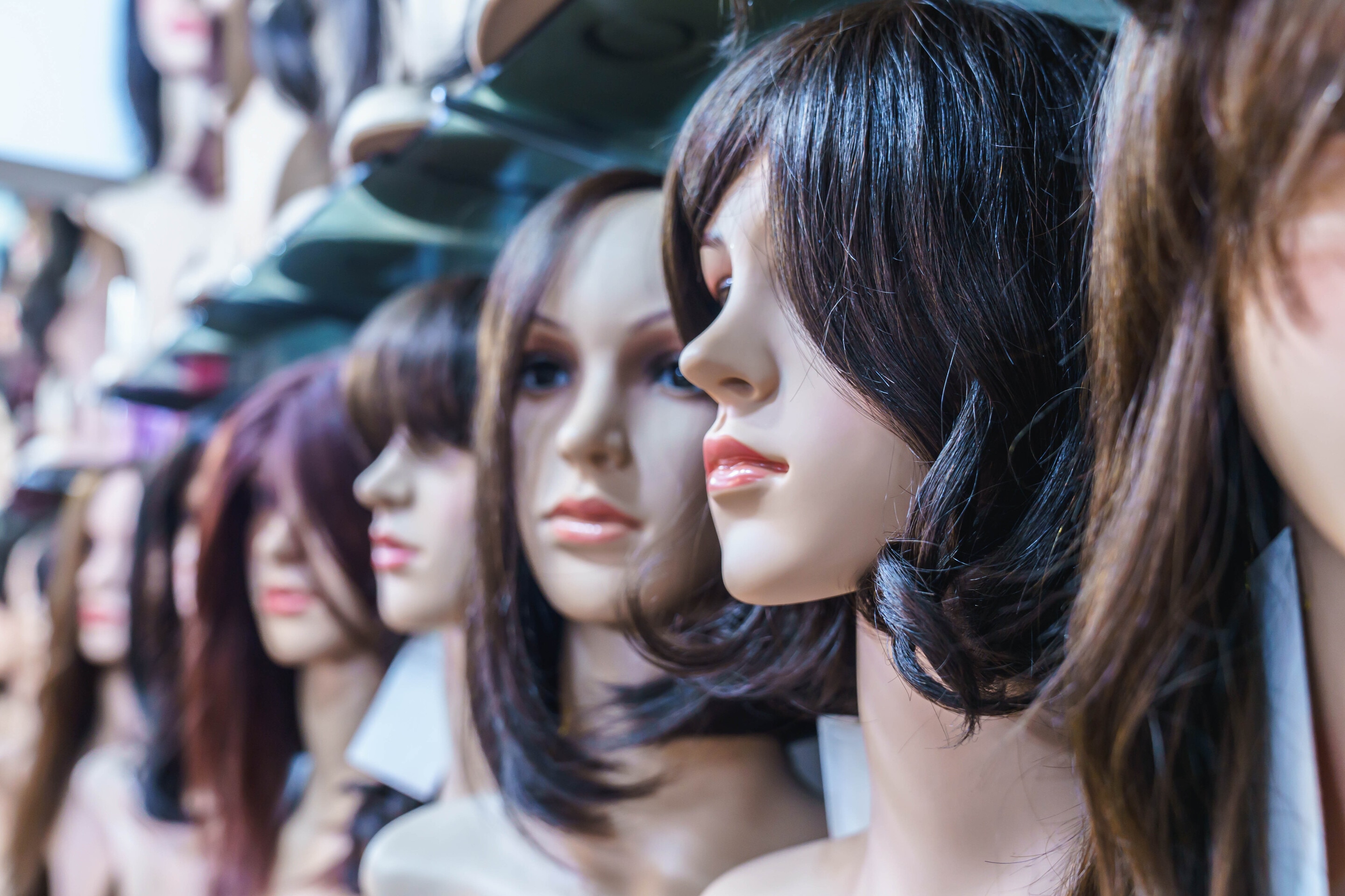Human hair wigs on stand
