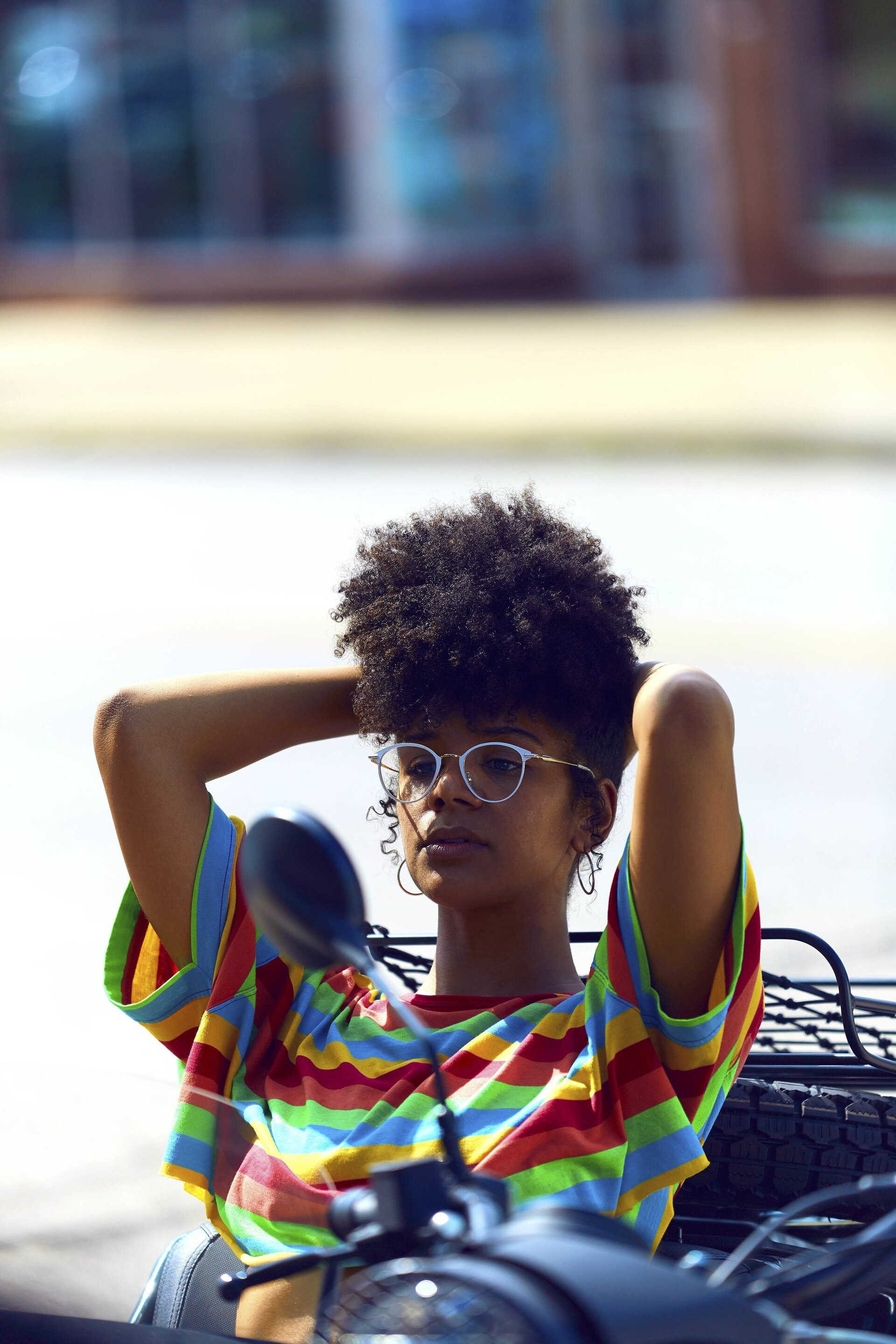 easy natural hairstyles: curly hair pineapple updo puff fauxhawk