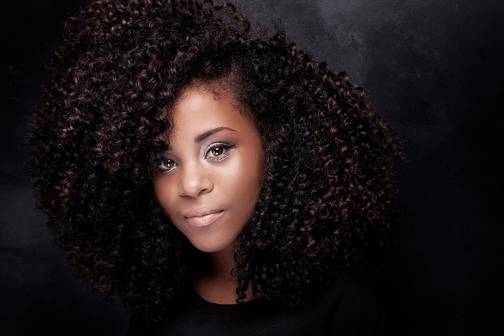 woman with big curly hair
