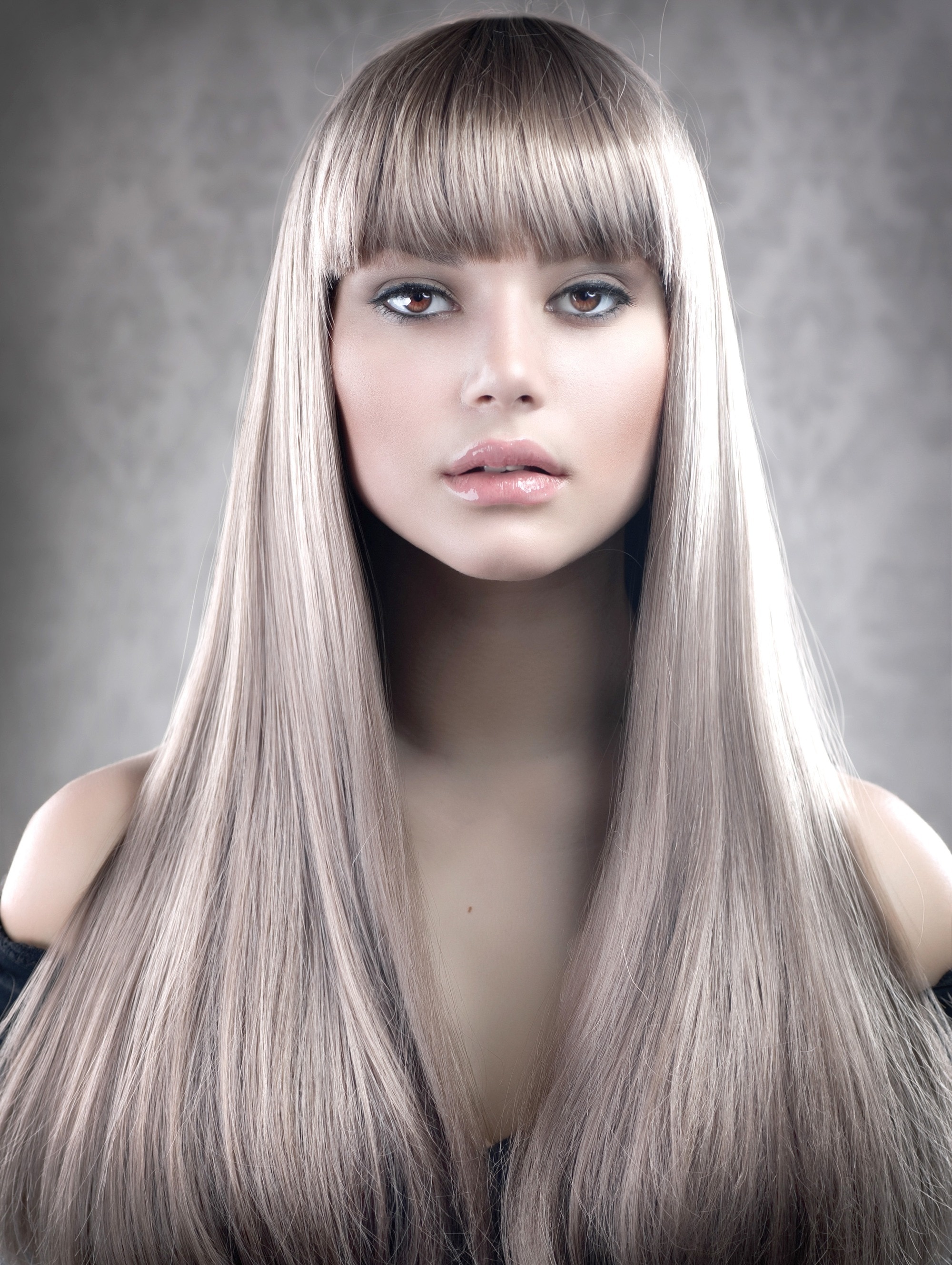 woman with long blonde hair bangs fringe