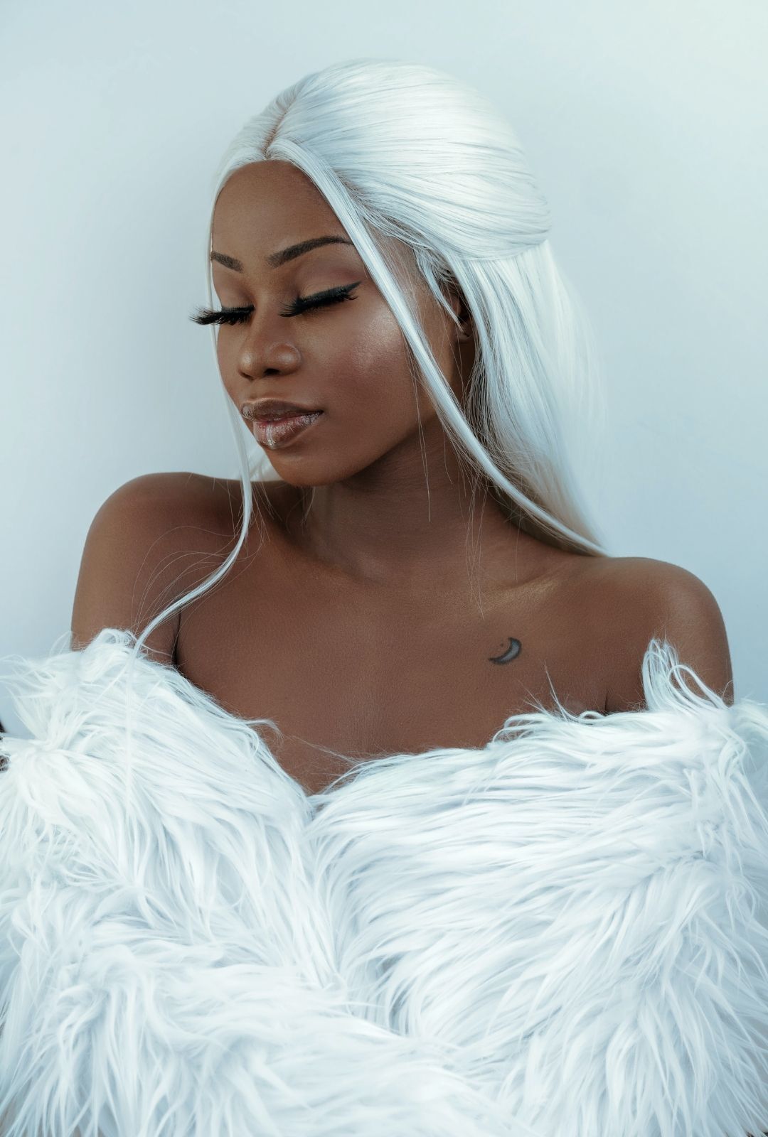 halloween hairstyle: woman with long sleek white hair