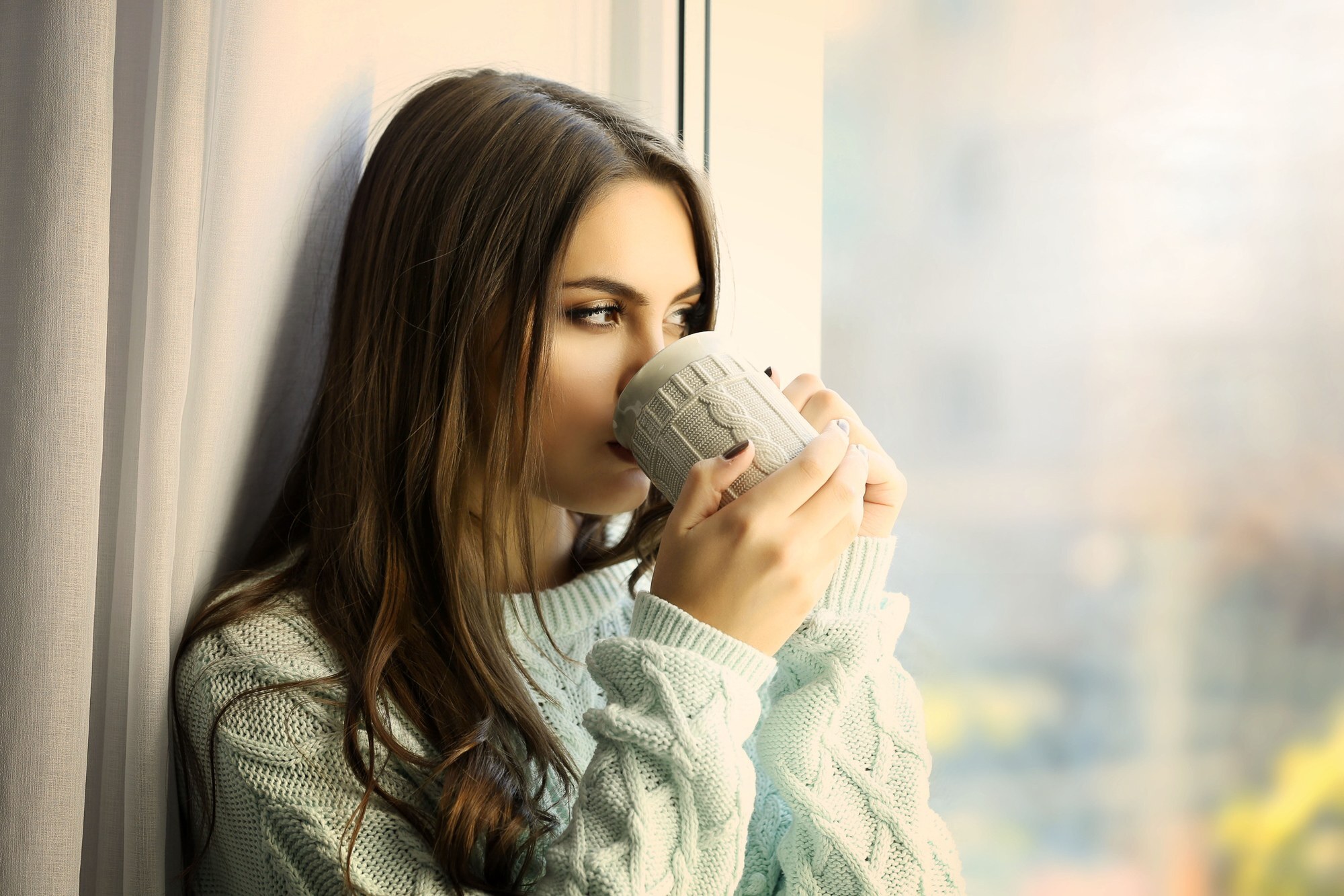 woman with coffee long straight hair