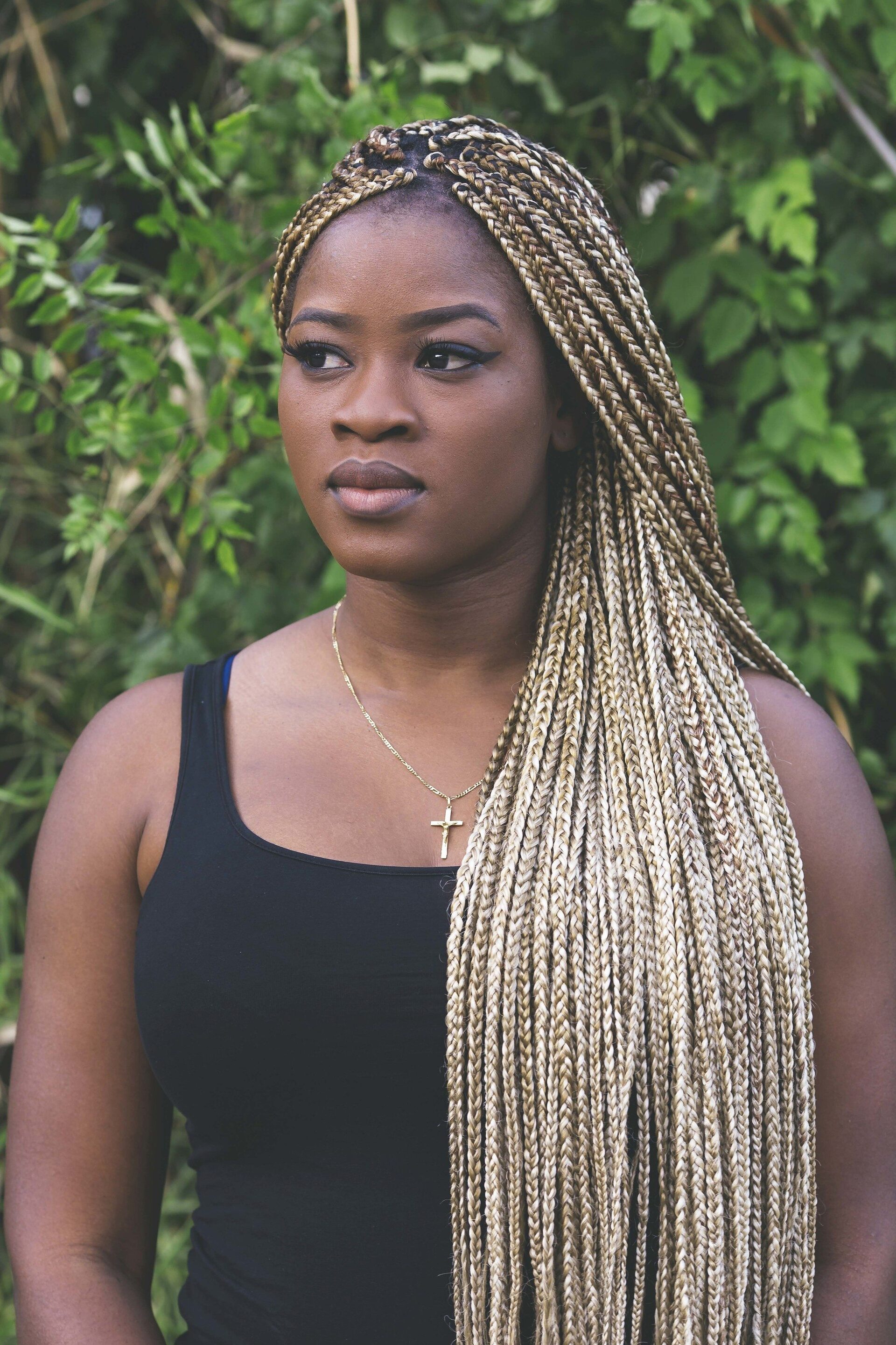 black woman with long box braids