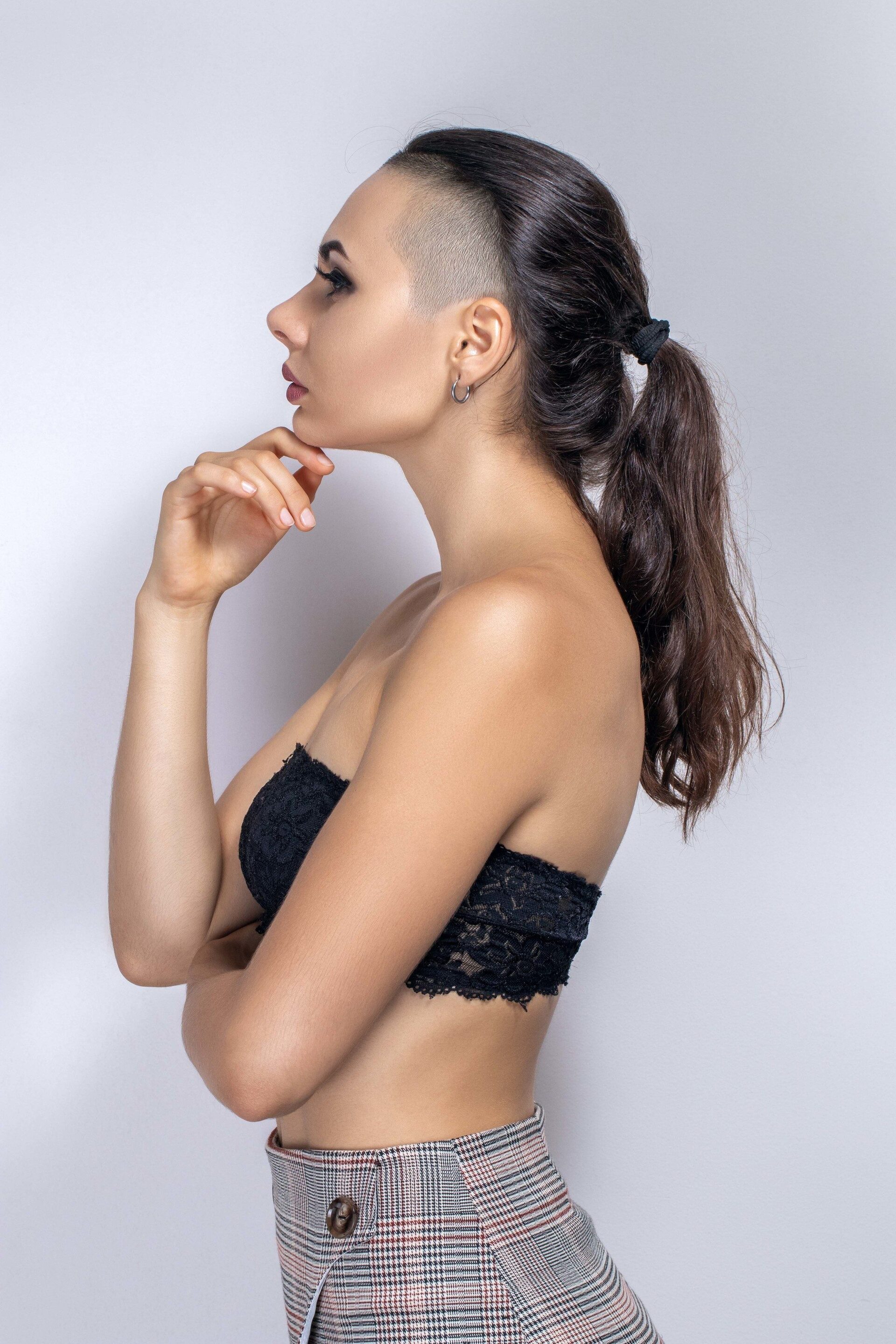 woman long brown hair with a side undercut