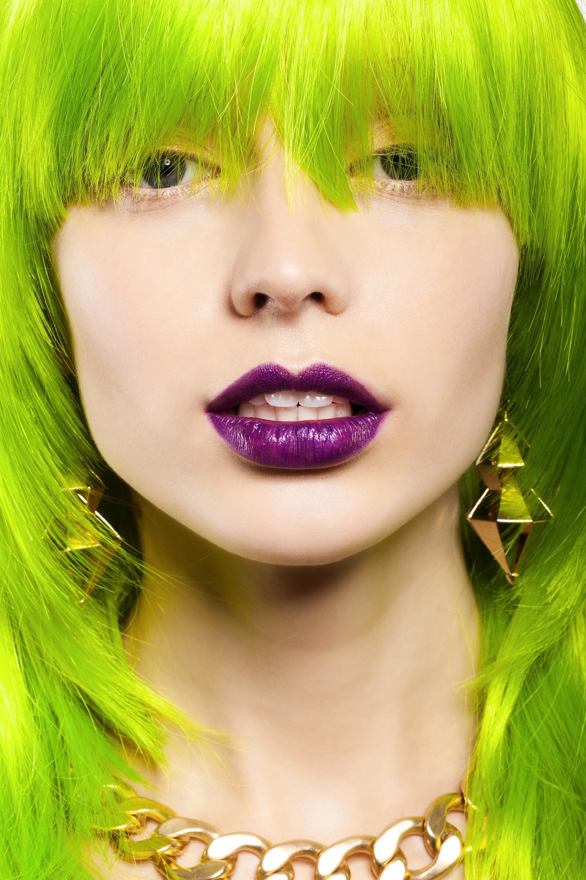 birthstone-inspired hair colour: Woman with bright lime green hair